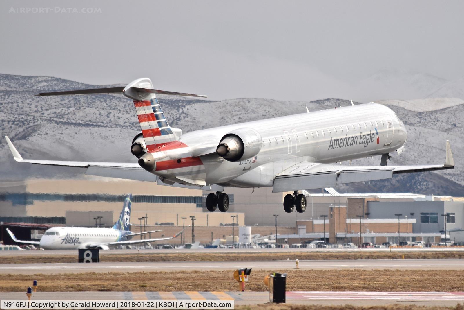 N916FJ, 2004 Bombardier CRJ-900ER (CL-600-2D24) C/N 15016, Landing RWY 10R.