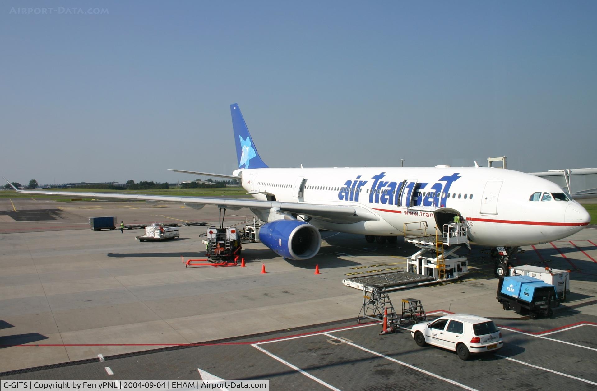 C-GITS, 1999 Airbus A330-243 C/N 0271, Air Transat A332  at the gate in AMS. TS509 to YVR.