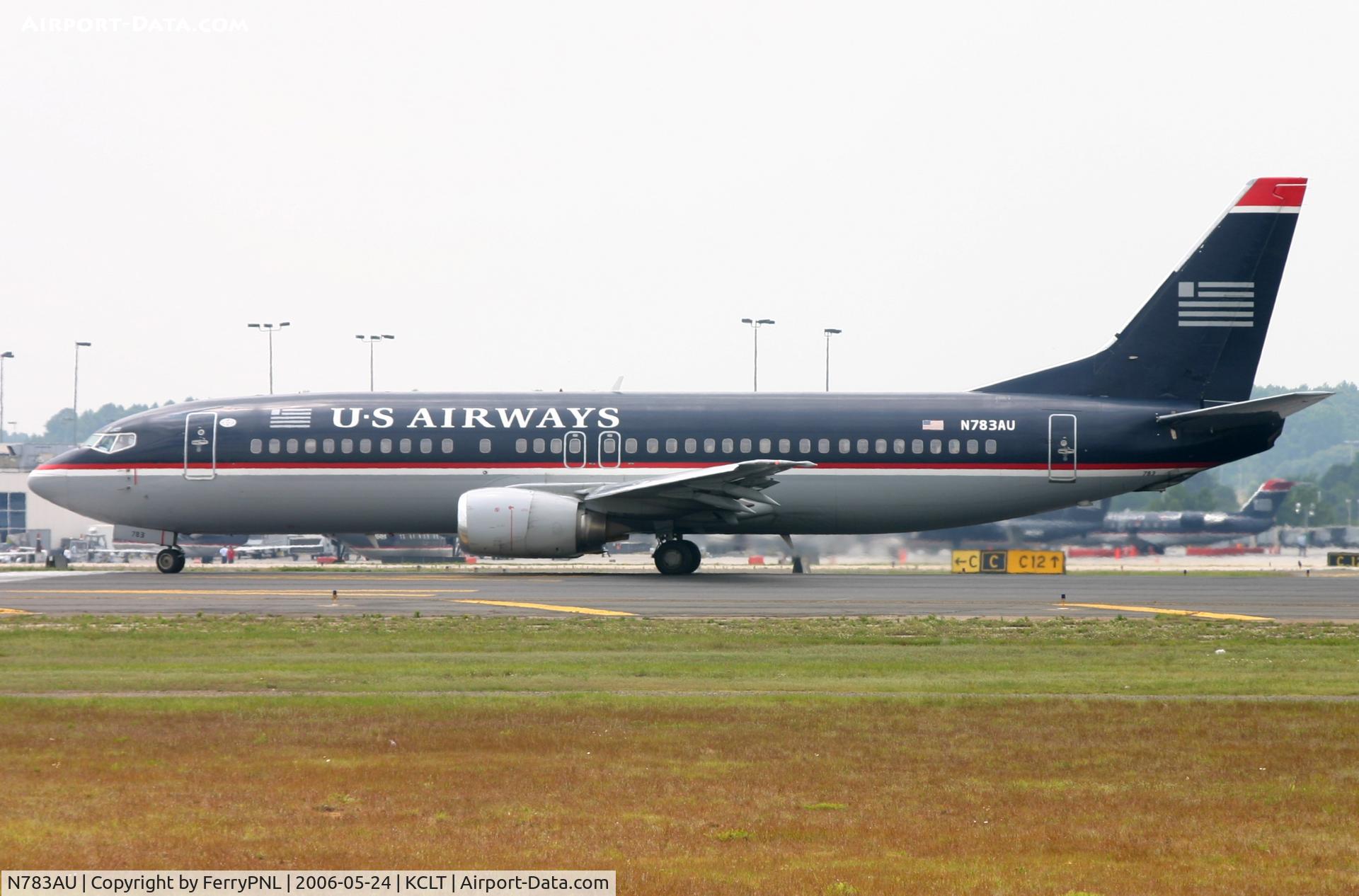 N783AU, 1991 Boeing 737-4B7 C/N 25022, US Airways B734 departing CLT. Re-regd to N458UW and later delivered to Swift Air.