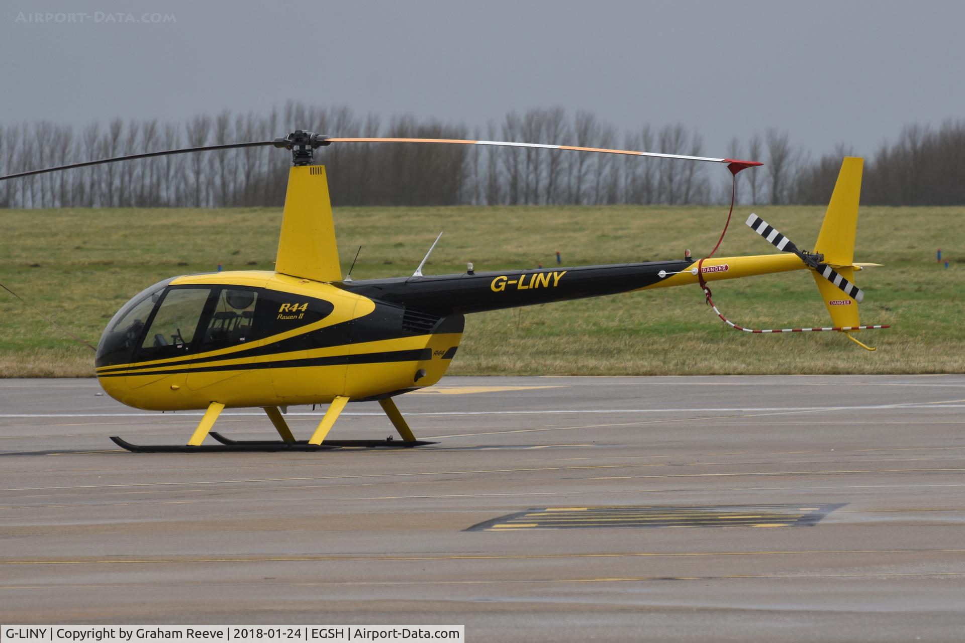 G-LINY, 2008 Robinson R44 Raven II C/N 12356, Parked at Norwich.