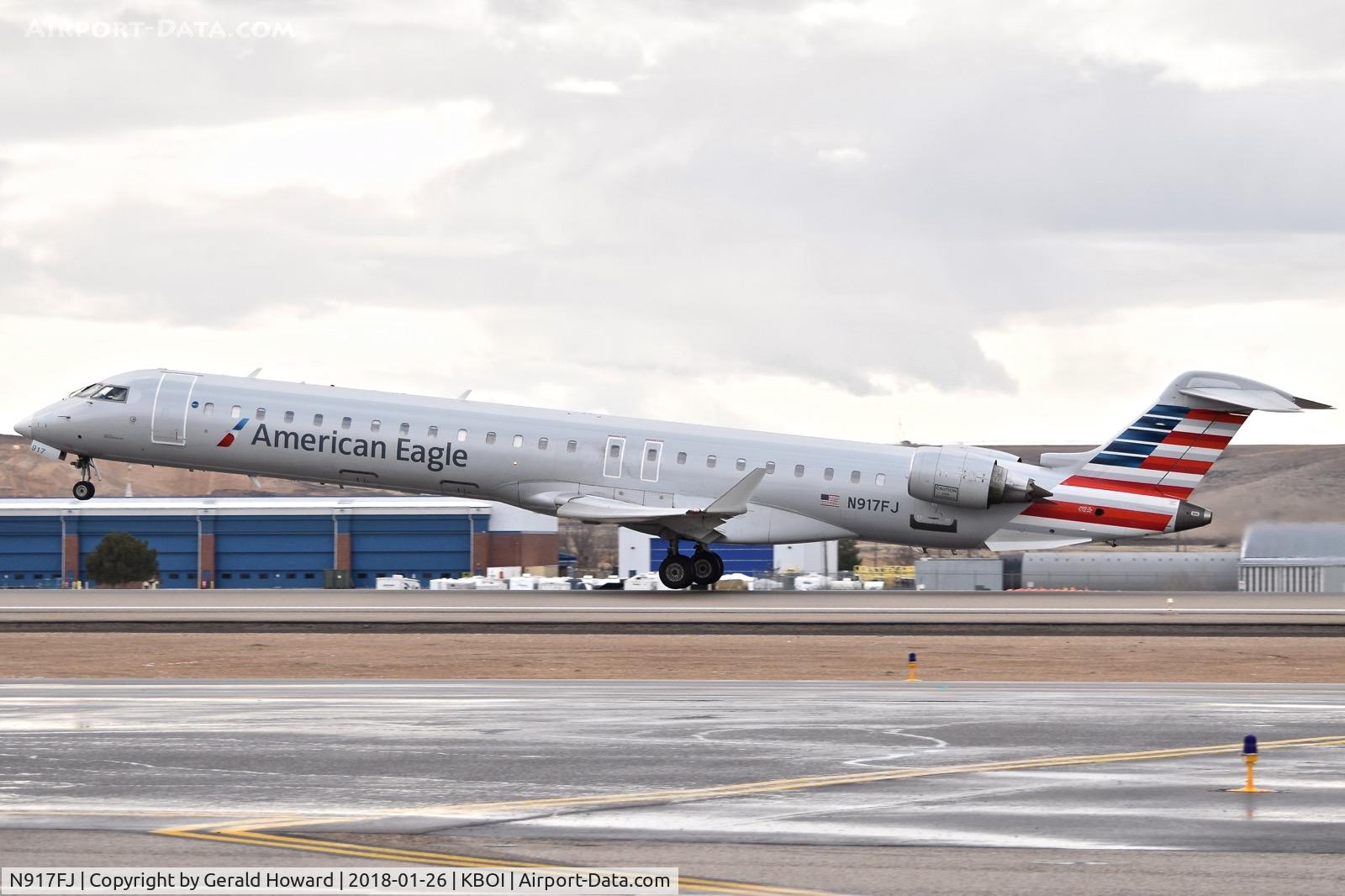 N917FJ, 2004 Bombardier CRJ-900ER (CL-600-2D24) C/N 15017, Take off from RWY 10L.