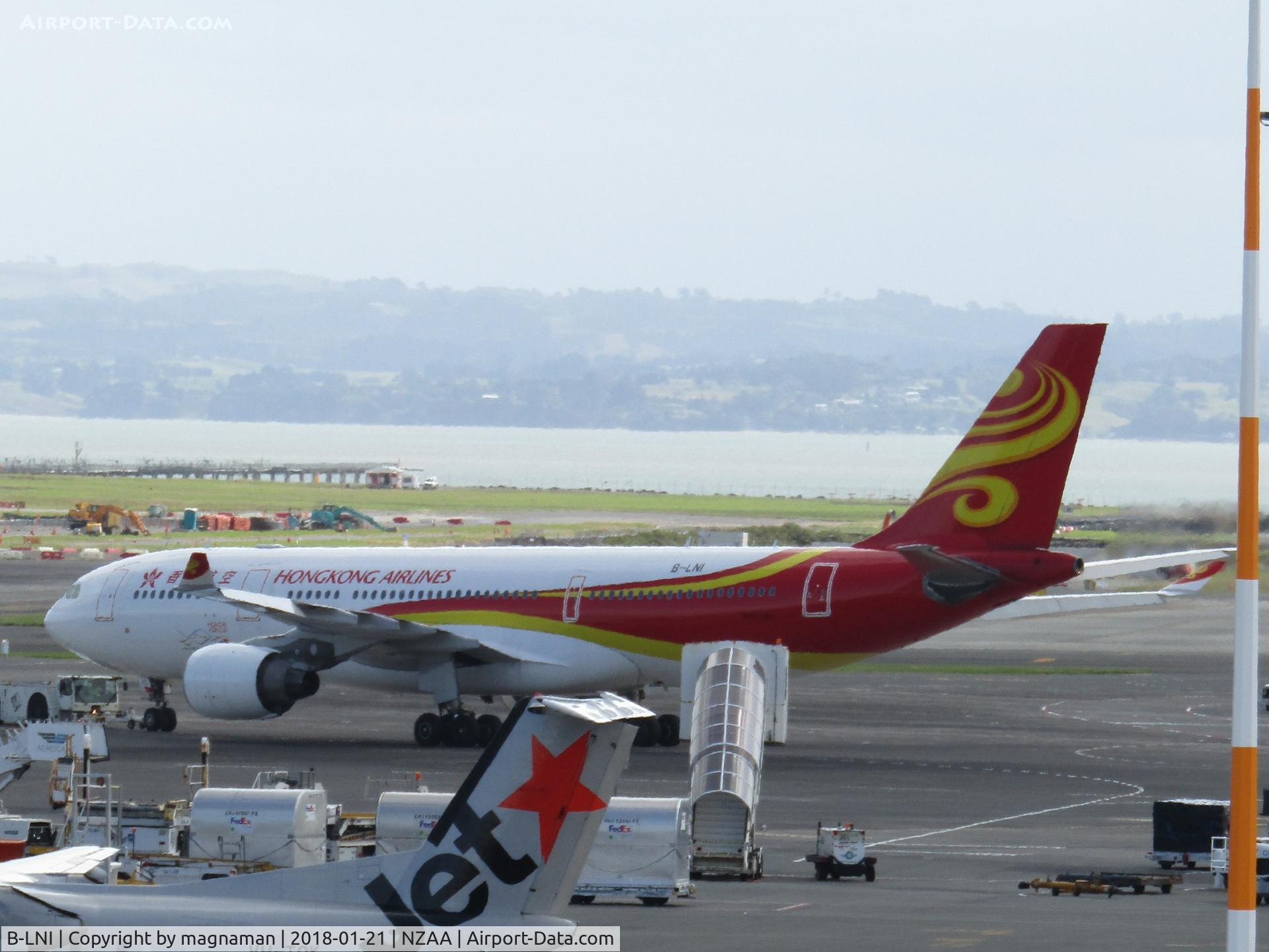 B-LNI, 2010 Airbus A330-223 C/N 1034, moving between stands