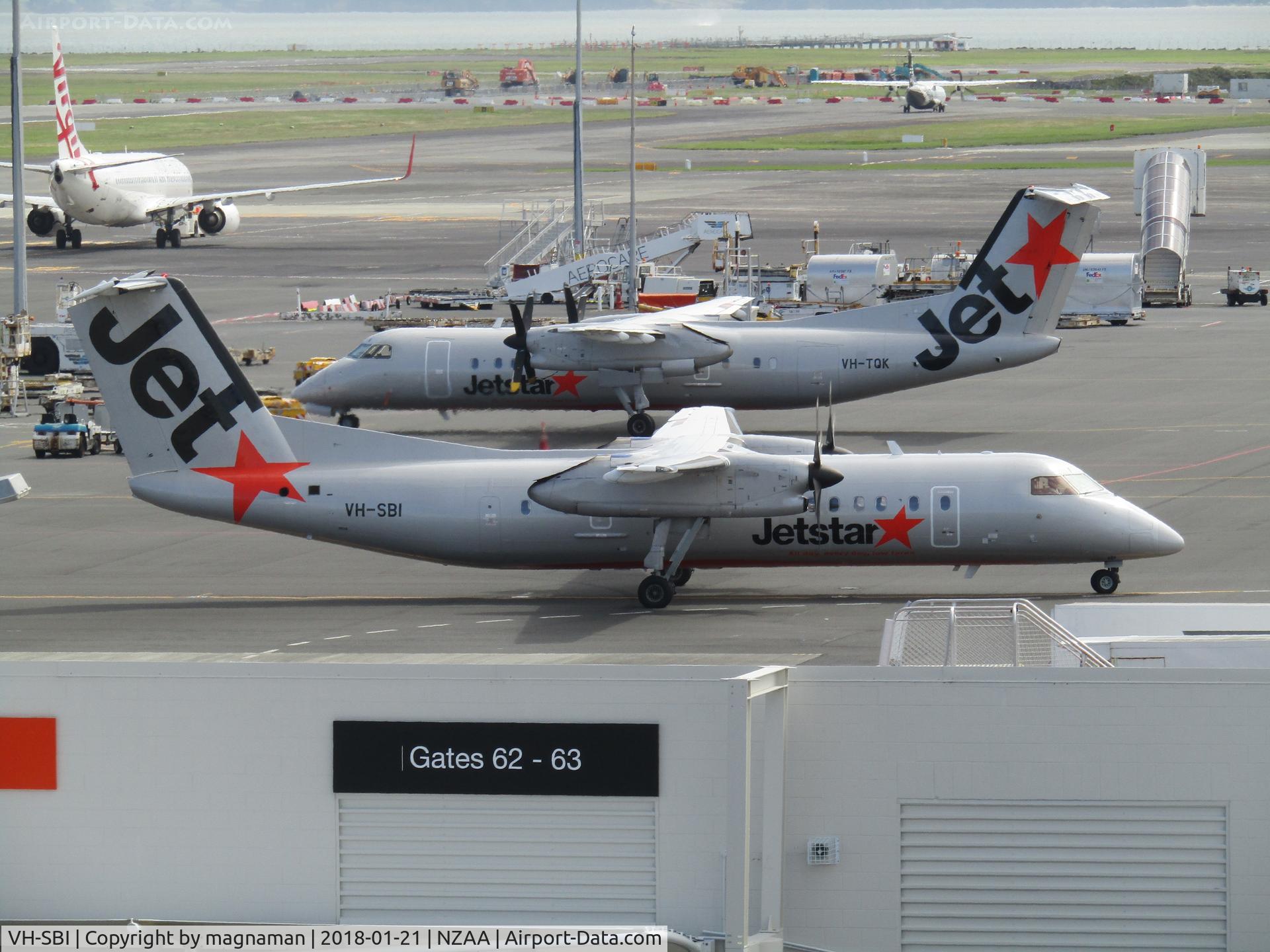 VH-SBI, 2004 De Havilland Canada DHC-8-315Q Dash 8 C/N 605, parking with sibling