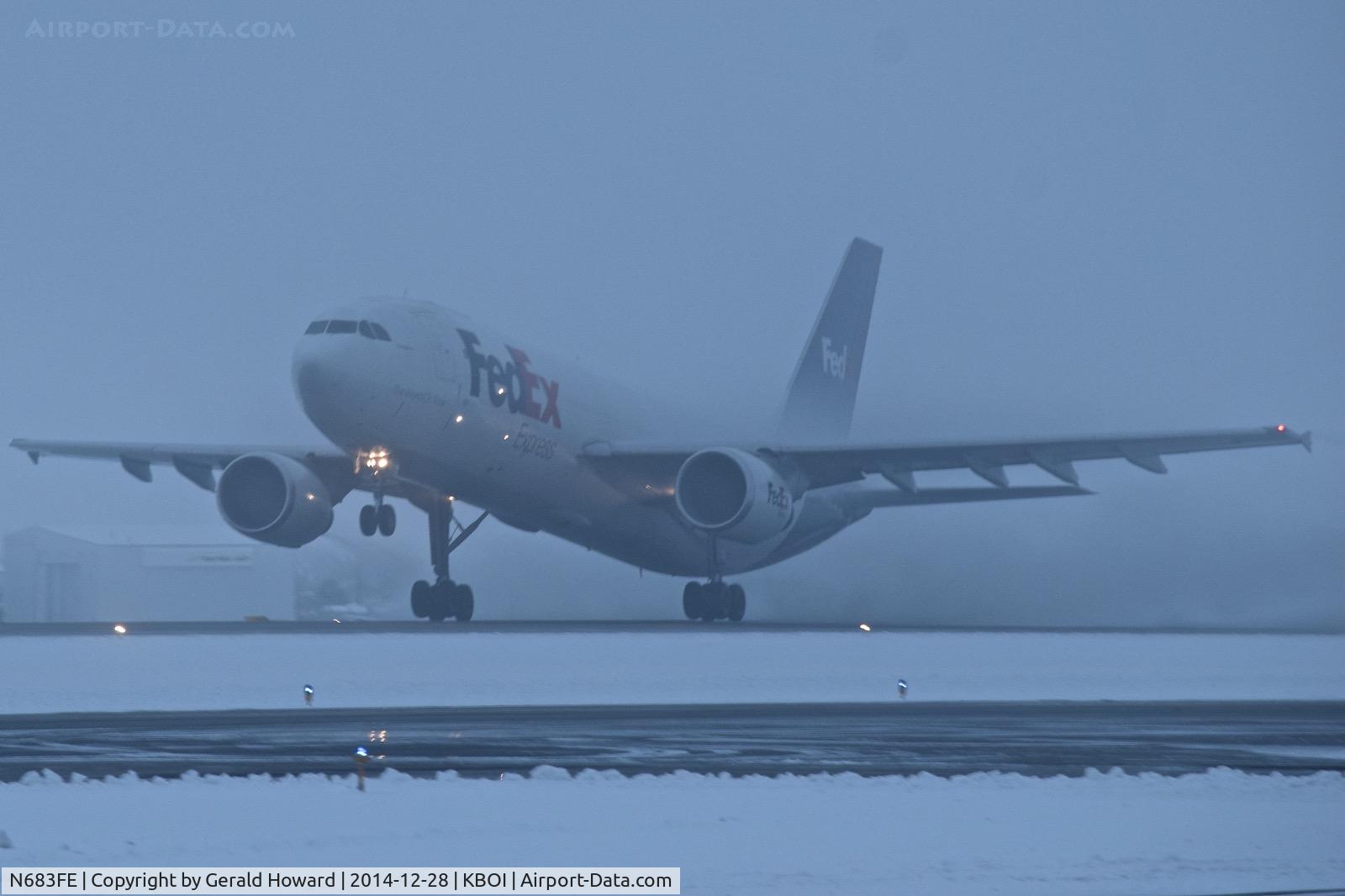 N683FE, 1999 Airbus A300F4-605R C/N 0801, Take of from RWY 10L on a snowy, foggy morning.