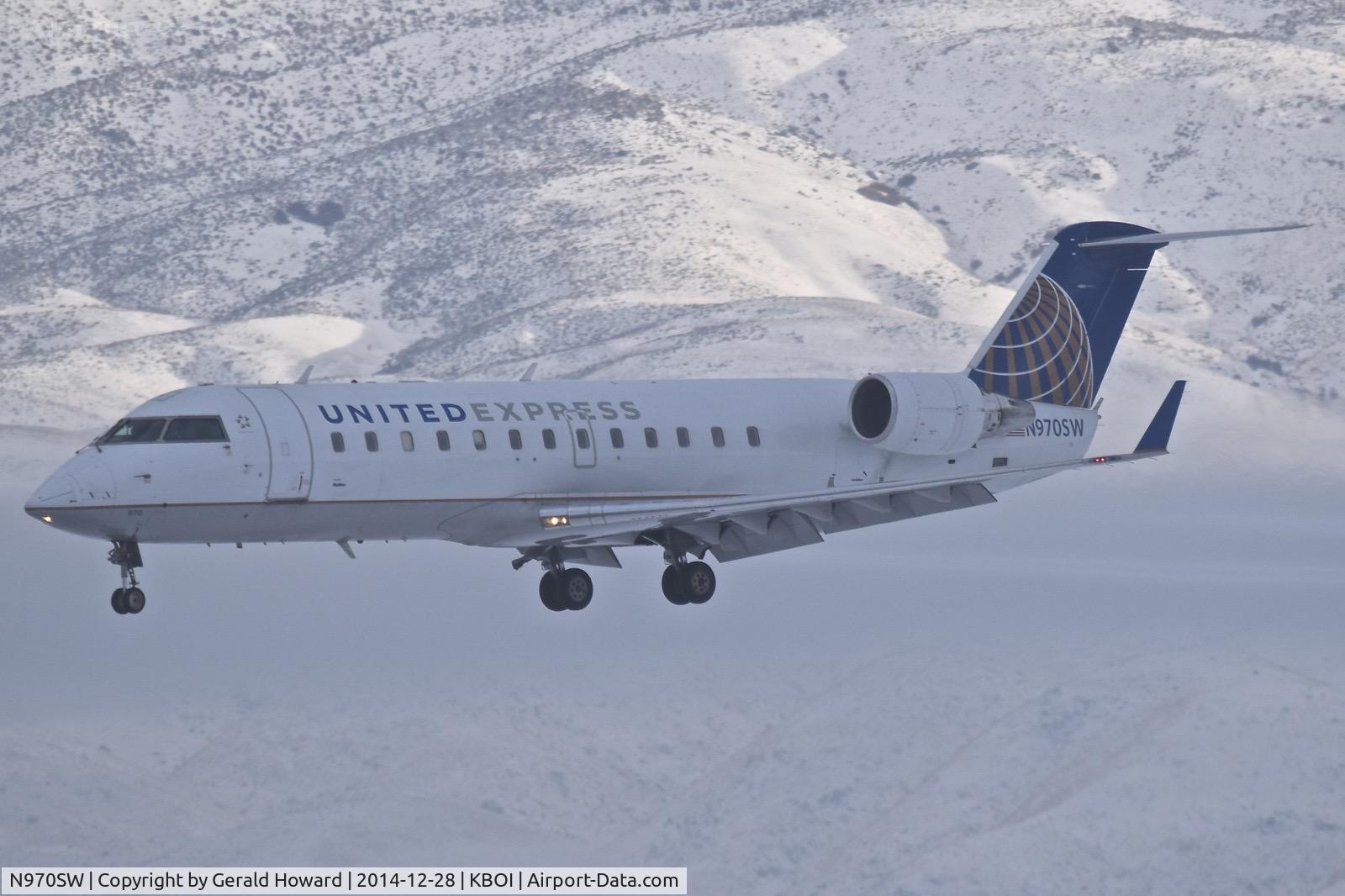 N970SW, 2003 Bombardier CRJ-200ER (CL-600-2B19) C/N 7881, Landing RWY 28R.