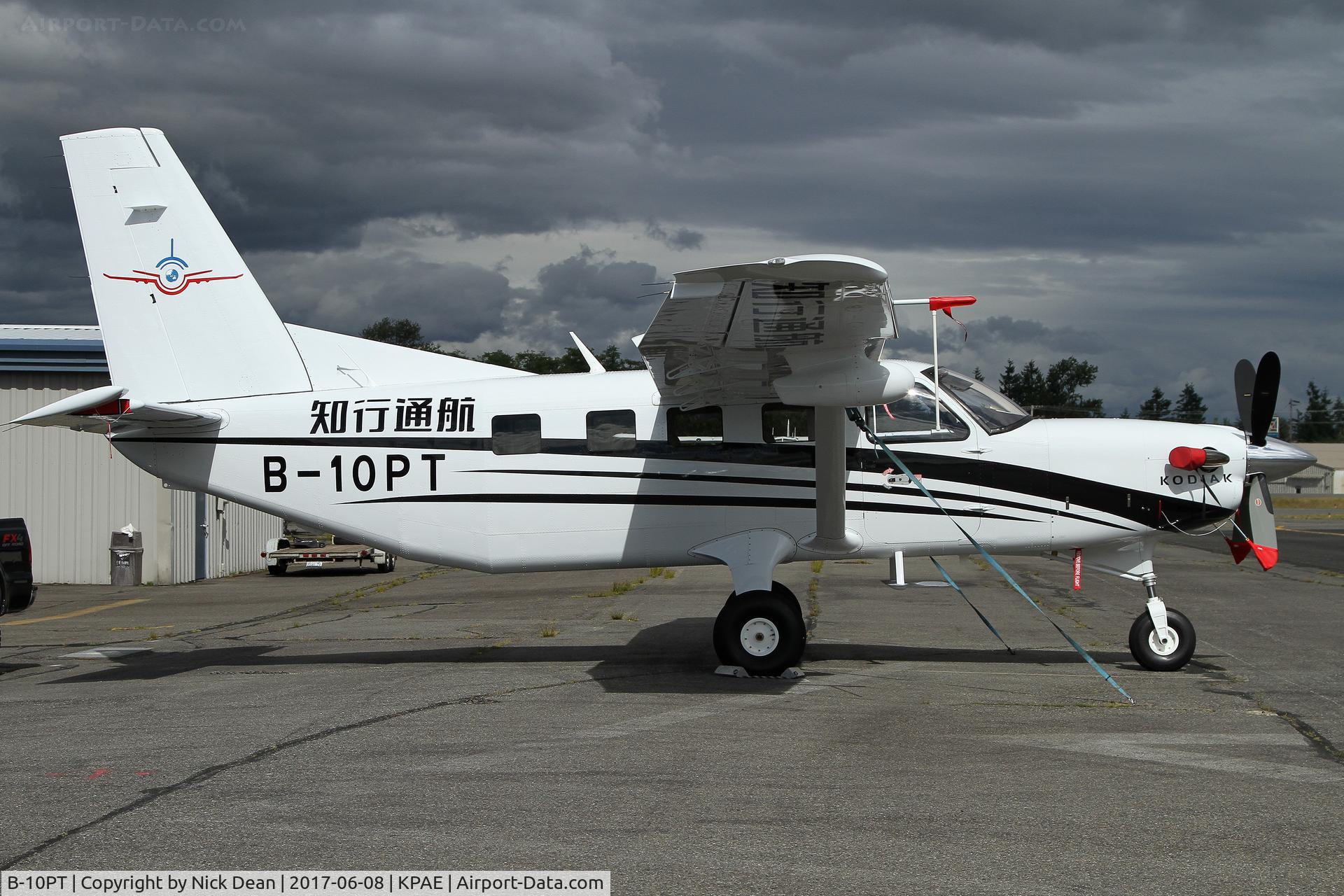 B-10PT, 2015 Quest Kodiak 100 C/N 100-0164, PAE/KPAE sitting outside the paint shop.