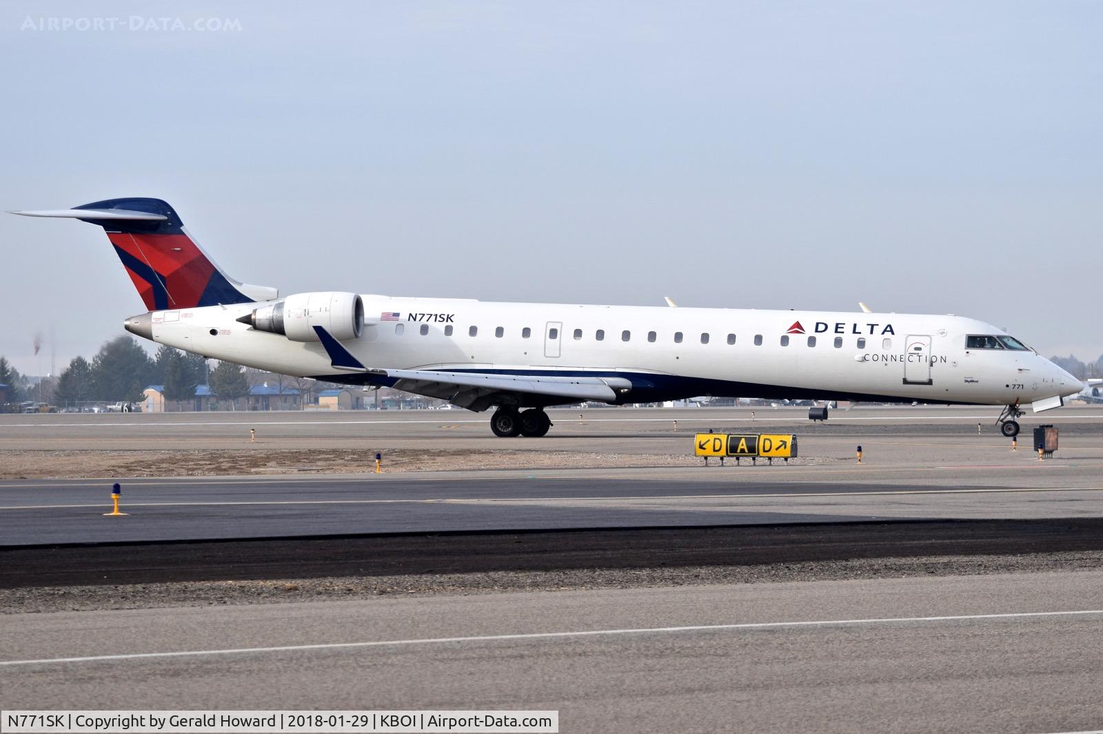 N771SK, 2006 Bombardier CRJ-700 (CL-600-2C10) Regional Jet C/N 10244, Taxiing to the ramp on Delta.