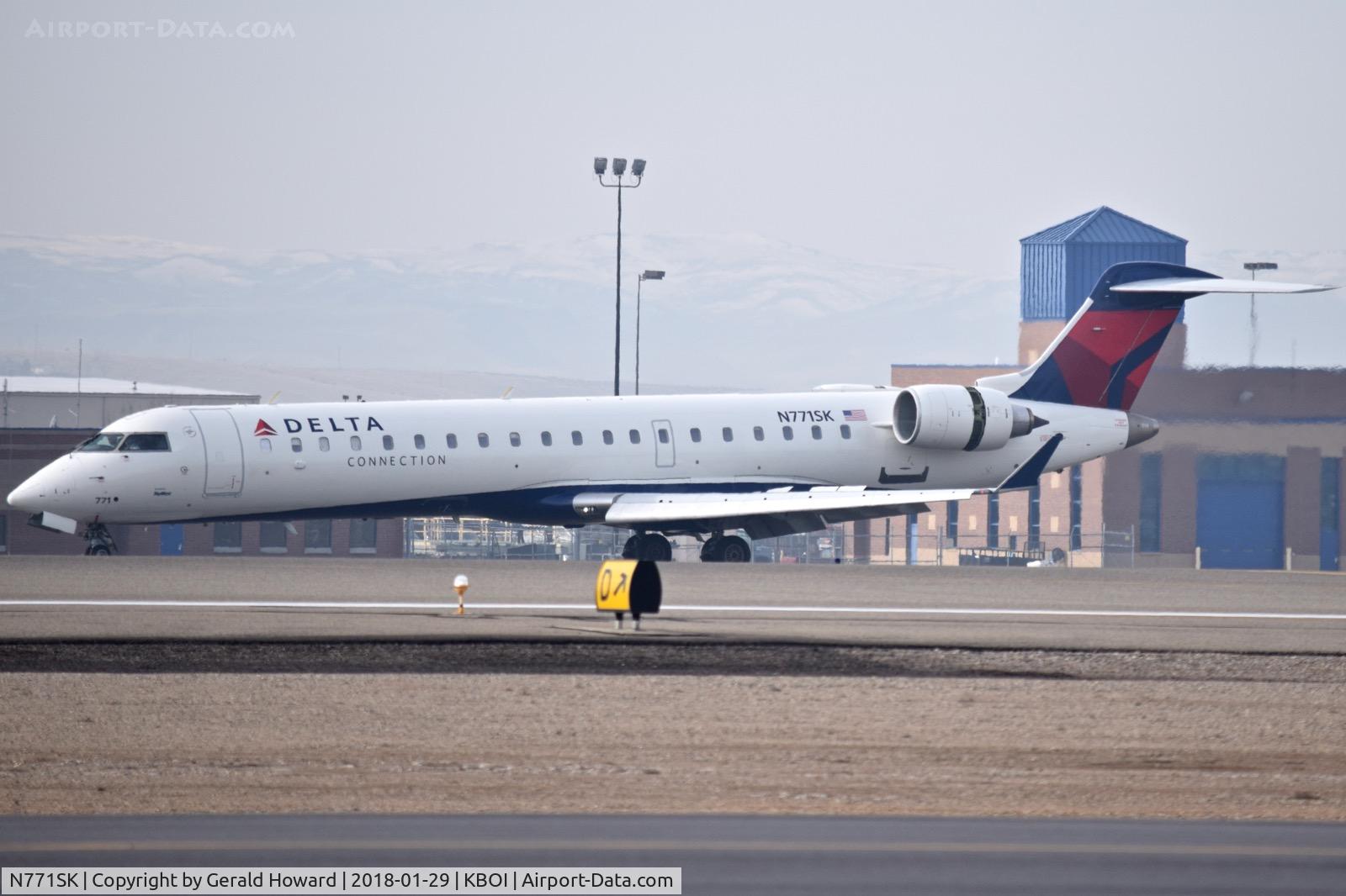 N771SK, 2006 Bombardier CRJ-700 (CL-600-2C10) Regional Jet C/N 10244, Landing roll out on RWY 10R.