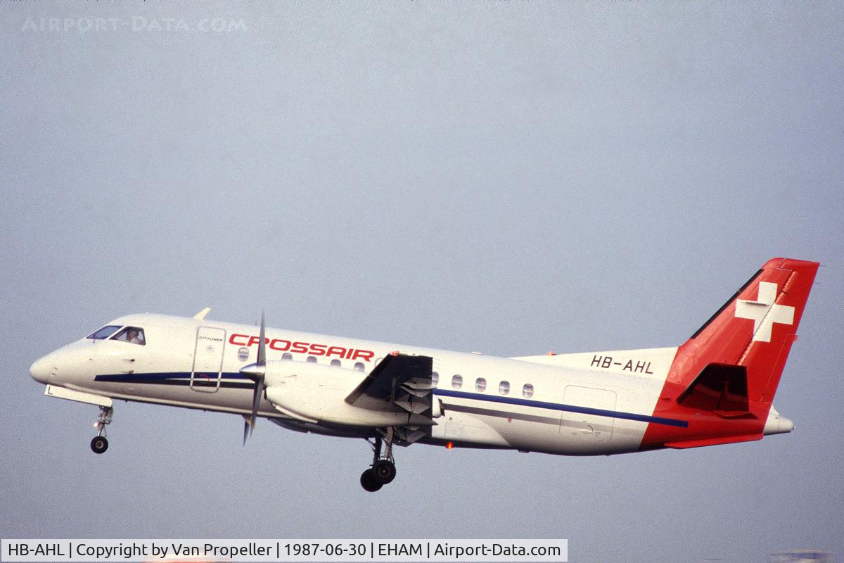 HB-AHL, 1987 Saab 340A C/N 340A-082, Crossair Saab 340A taking off from Schiphol airport, the Netherlands, 1987