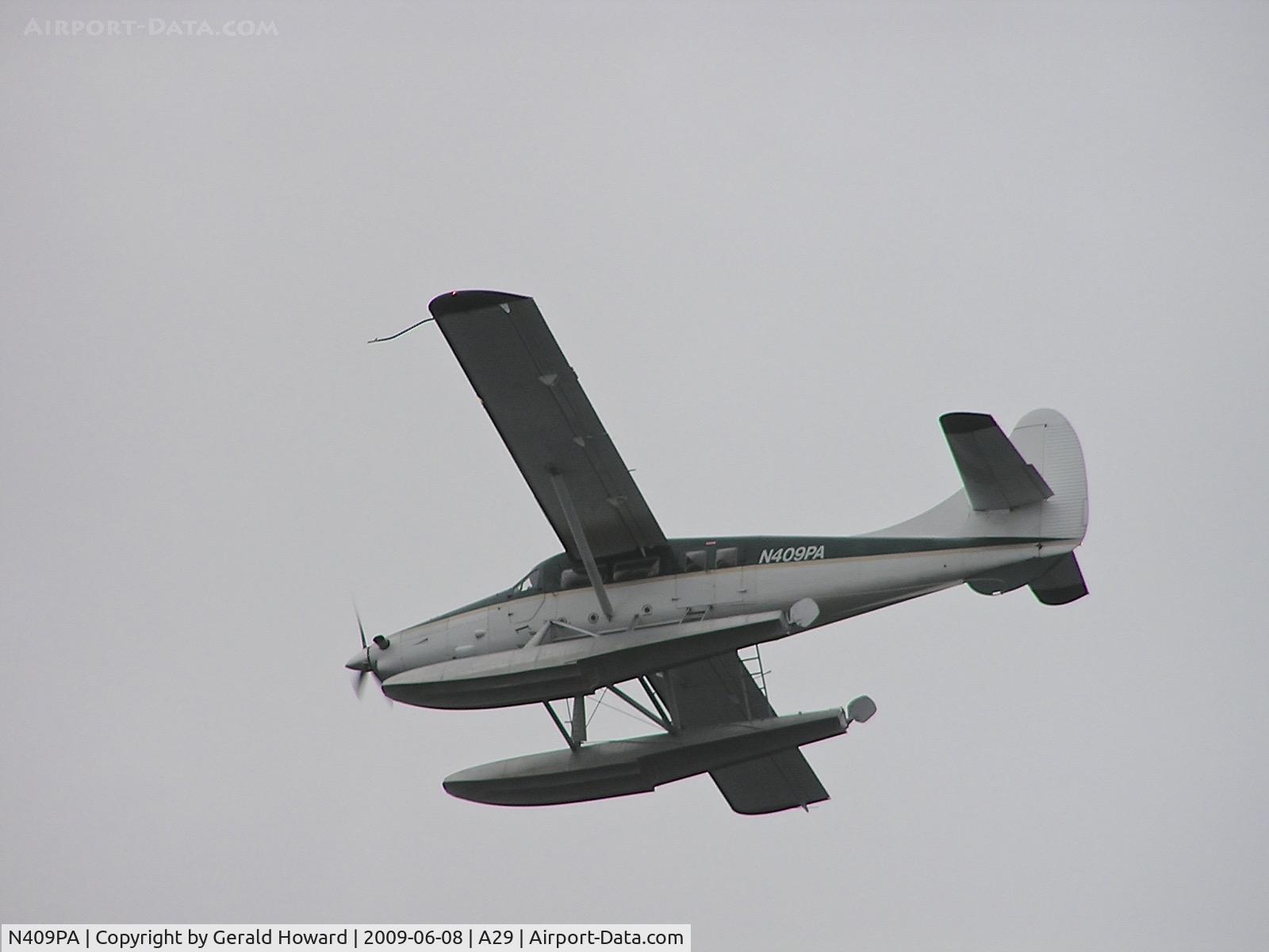 N409PA, 1960 De Havilland Canada DHC-3 Turbo Otter Otter C/N 409, Flying over Sitka.