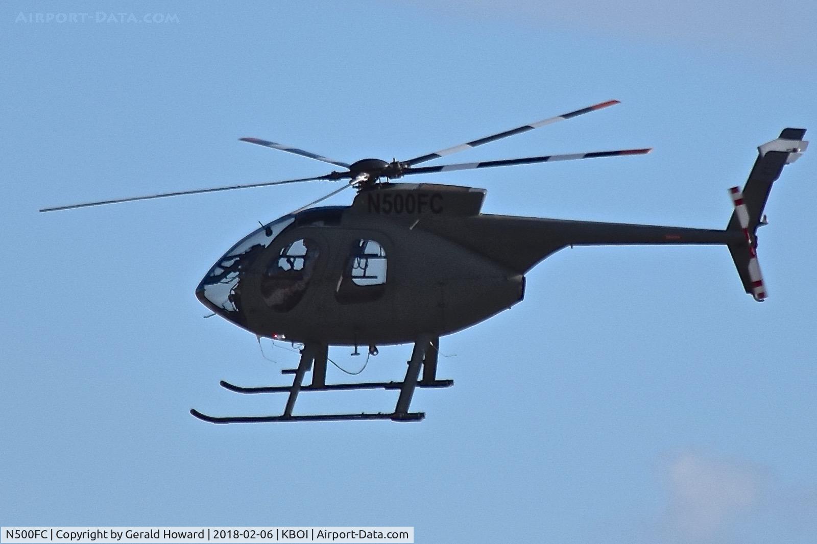N500FC, 1983 MD Helicopters 369E C/N 0442E, Flying north across the runways.