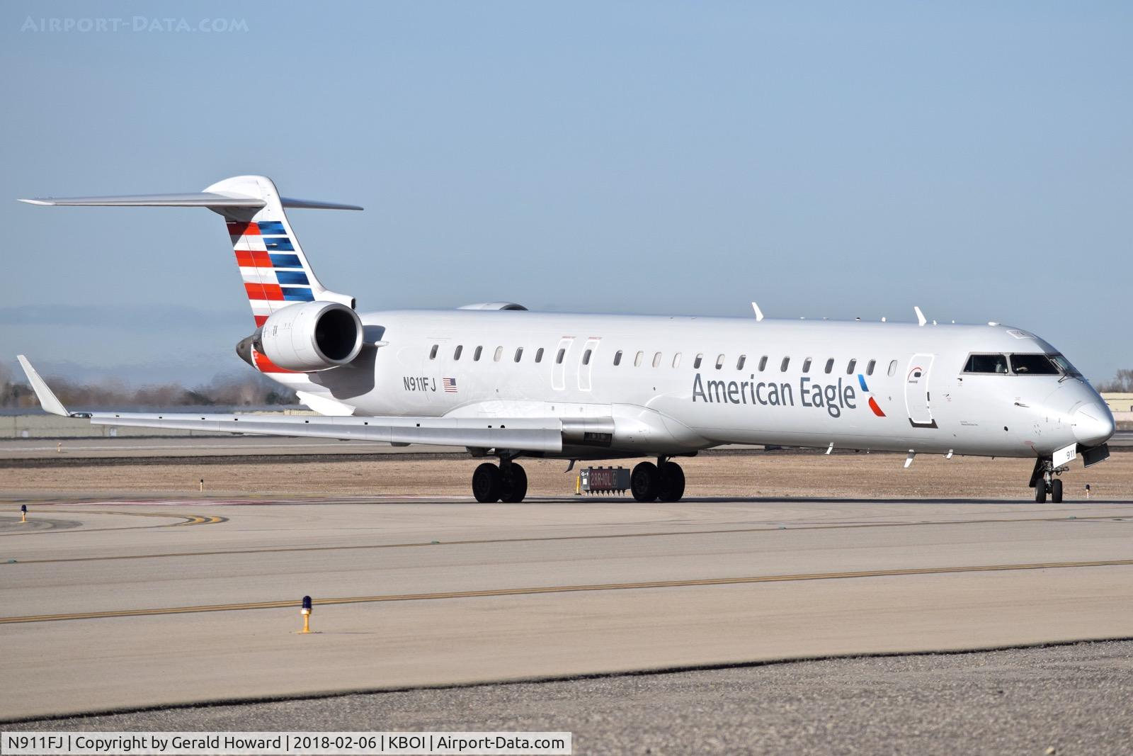 N911FJ, 2003 Bombardier CRJ-900ER (CL-600-2D24) C/N 15011, Turning onto Alpha.