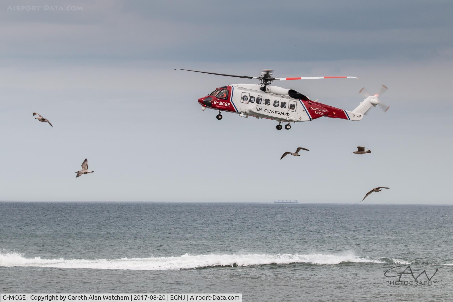 G-MCGE, 2014 Sikorsky S-92A C/N 920214, G-MCGE Performing Flypast with Seagulls
