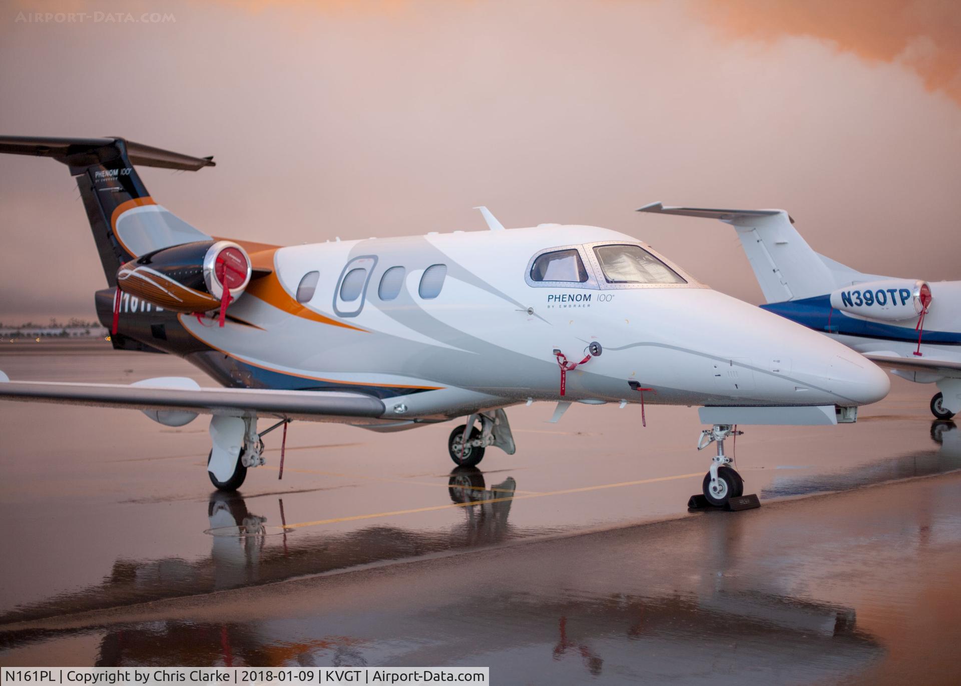 N21FJ, Gulfstream Aerospace G-IV C/N 1016, Embraer Phenom 100 parked on the North Las Vegas Ramp.