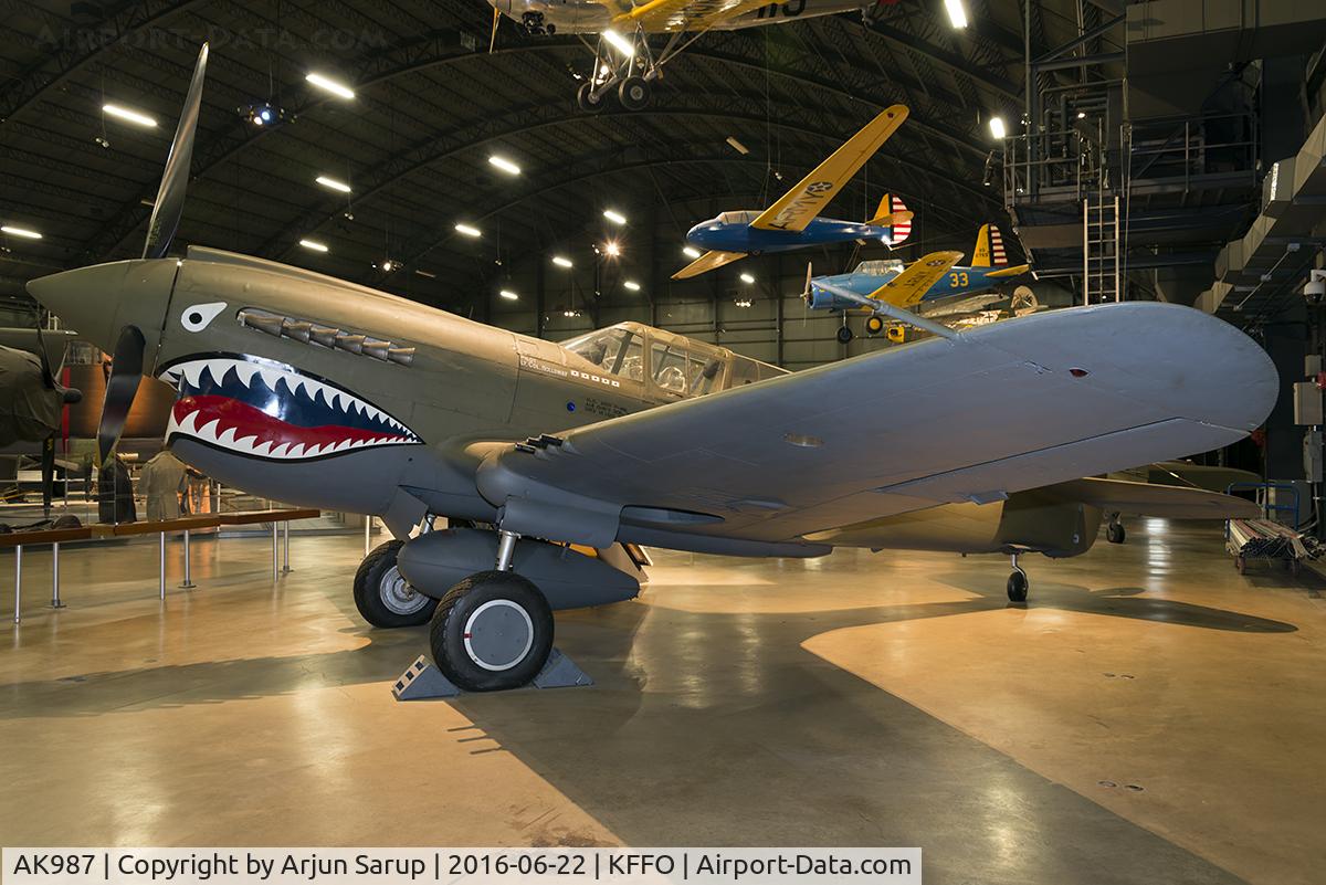 AK987, 1942 Curtiss P-40E Kittyhawk 1A C/N 18731, On display at the National Museum of the U.S. Air Force.  This former RCAF P-40 is painted to represent the aircraft flown by Col. Bruce Holloway of the Flying Tigers and its successor, the 23rd Fighter Group.