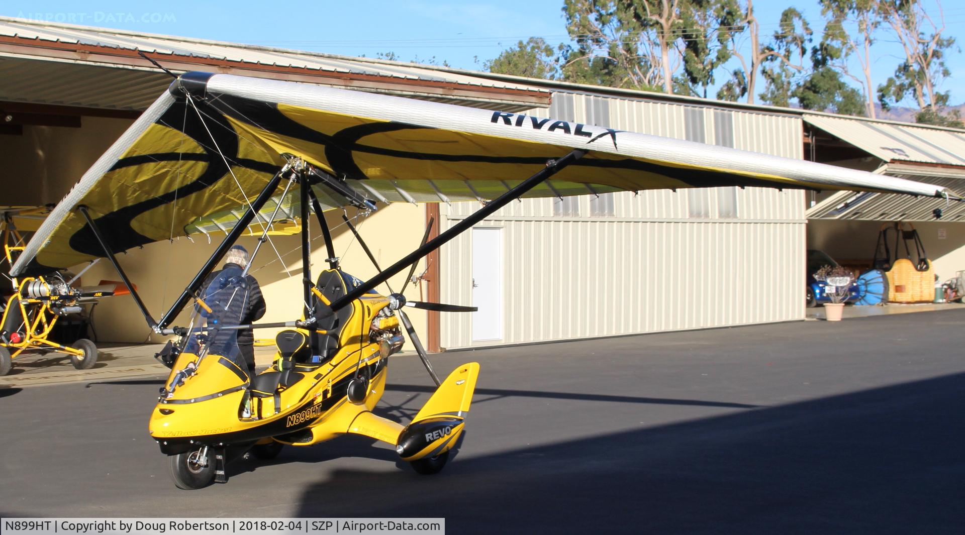 N899HT, 2016 Evolution Trikes Revo C/N 000618, 2016 Evolution Aircraft Inc. REVO weight-shift control LSA, Rotax 912ULS 100 Hp pusher, outside its hangar