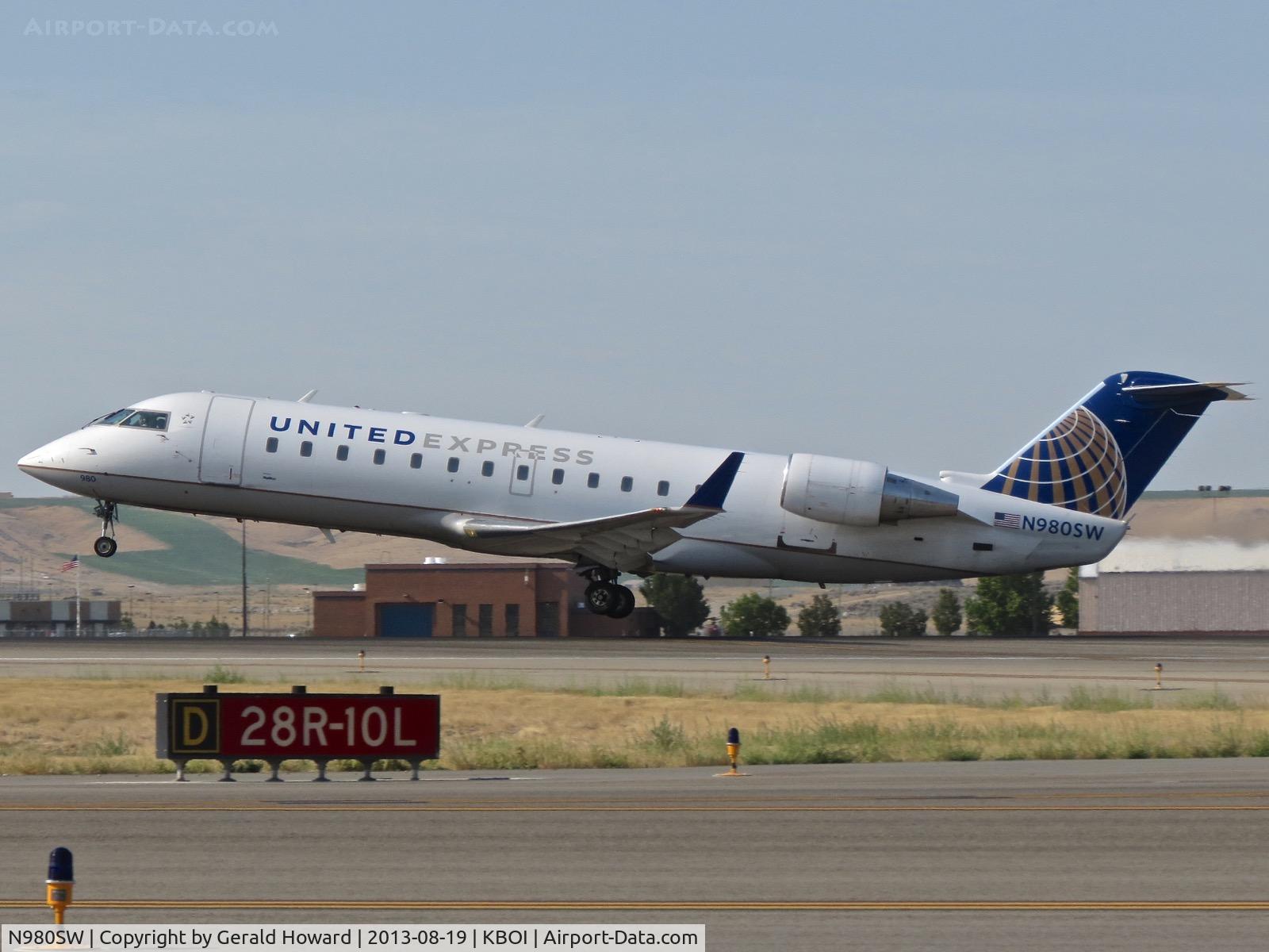 N980SW, 2004 Bombardier CRJ-200ER (CL-600-2B19) C/N 7955, Departing RWY 10L.