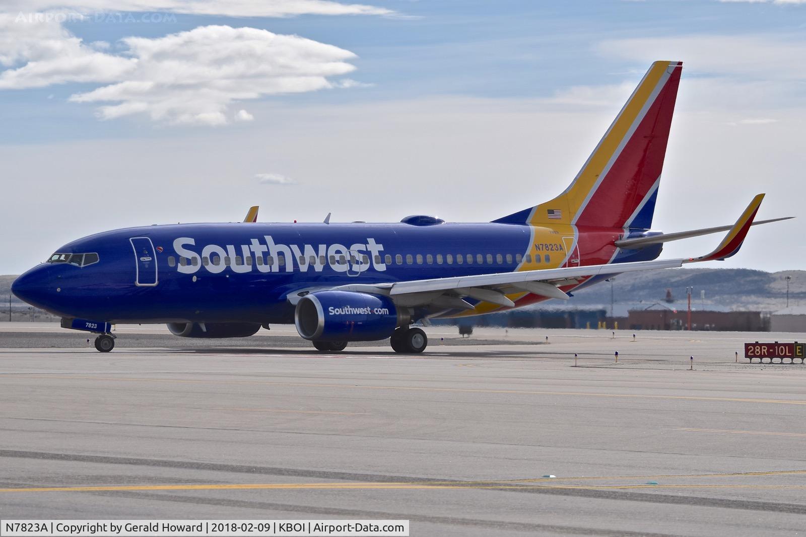 N7823A, 2003 Boeing 737-7CT C/N 32749, Coming Off RWY 28R for the commercial ramp.