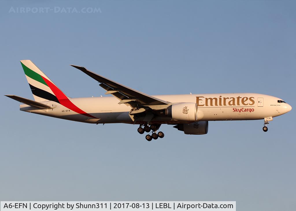 A6-EFN, 2014 Boeing 777-F1H C/N 42232, Landing rwy 25R