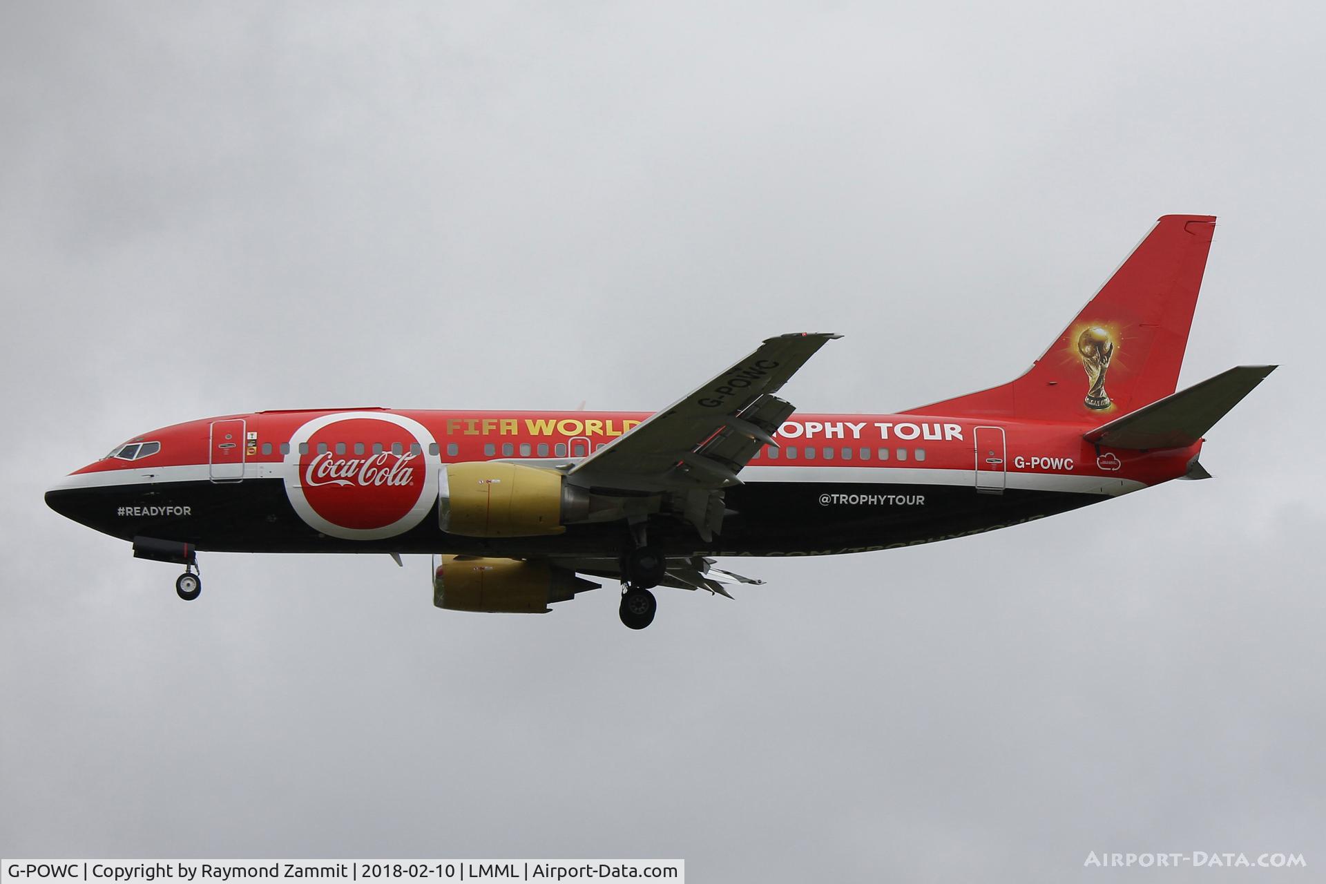 G-POWC, 1991 Boeing 737-33A(QC) C/N 25402, B737-300 G-POWC Titan Airways wearing the FIFA World Cup Tour titles landing in Malta.