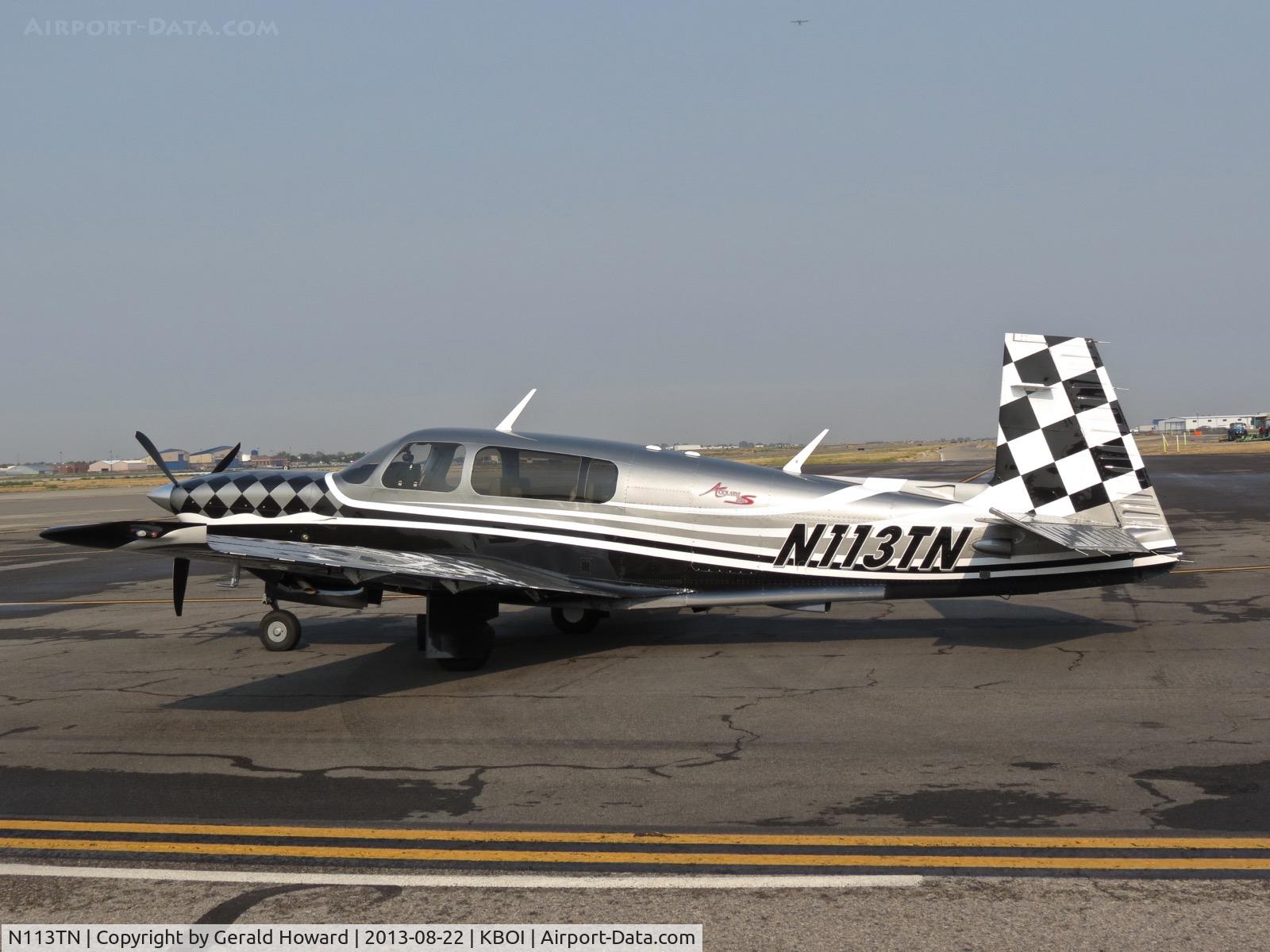 N113TN, 2008 Mooney M20TN Acclaim C/N 31-0113, Parked on the U. S. Customs ramp.