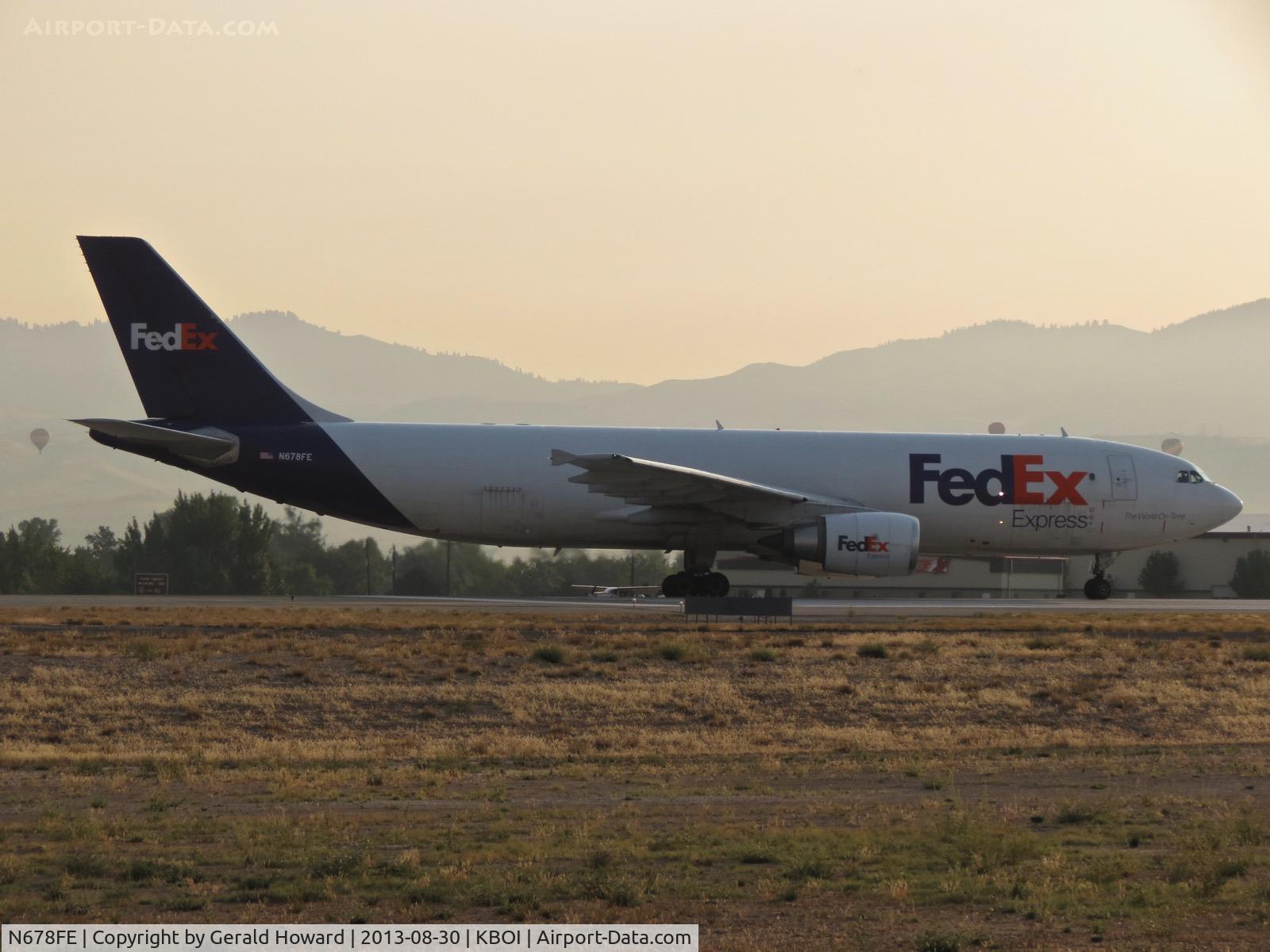 N678FE, 1998 Airbus A300F4-605R C/N 792, Early morning take off on RWY 10L. Notice the balloons floating in the background.
