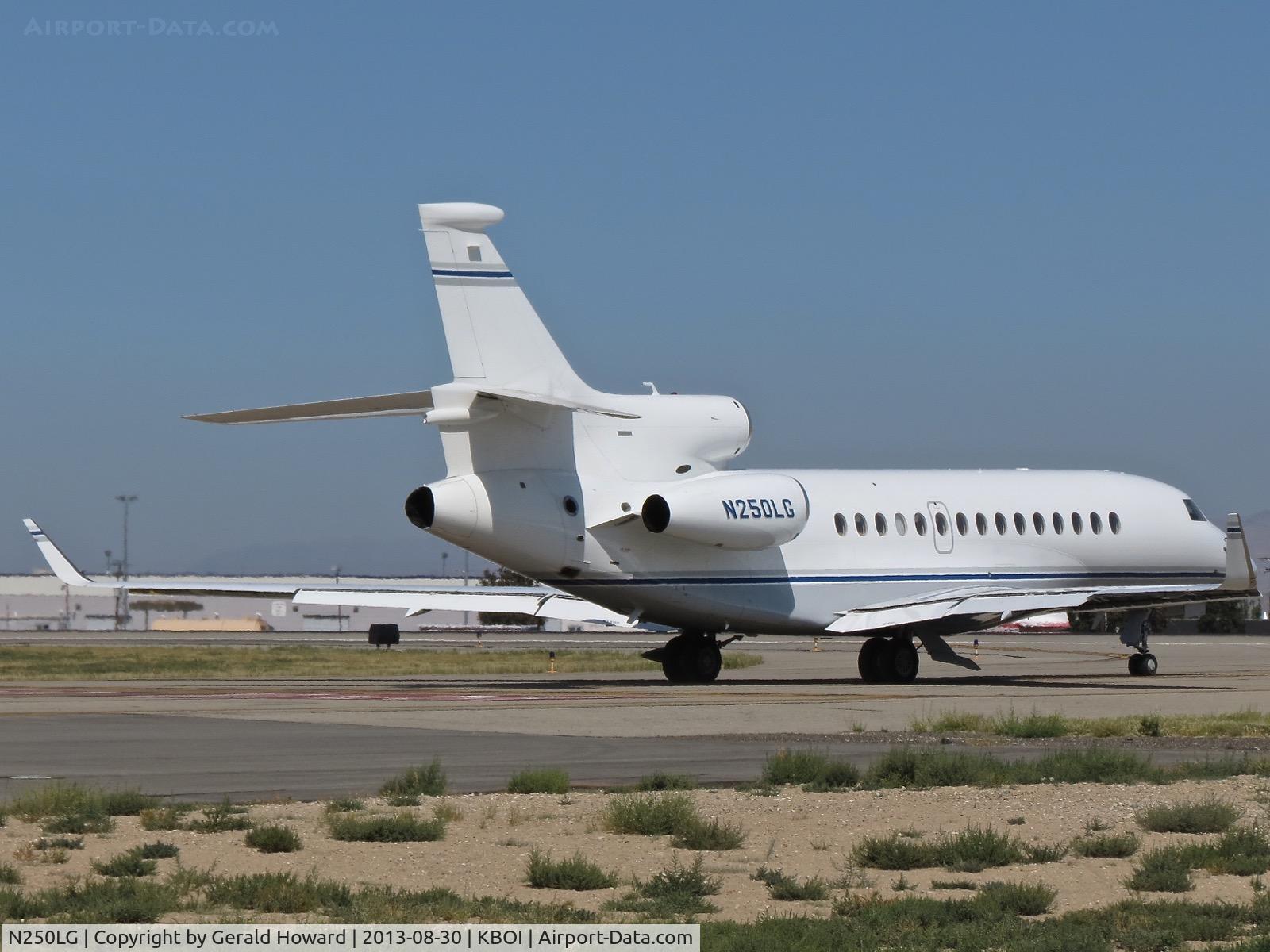 N250LG, 2008 Dassault Falcon 7X C/N 12, taxiing on Mike between the runways.