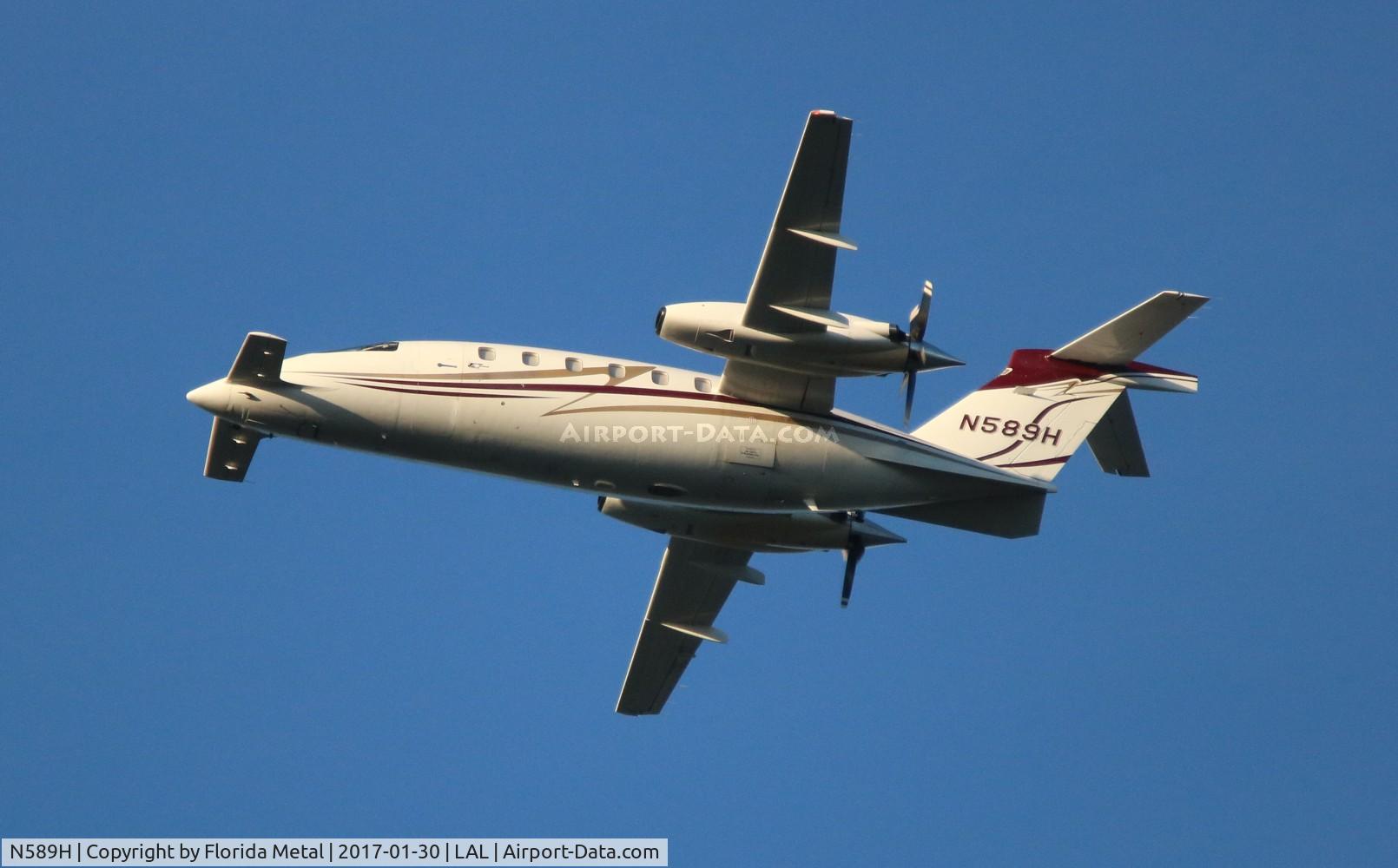 N589H, 1991 Piaggio P-180 C/N 1010, P180 over Circle B Bar Nature Preserve