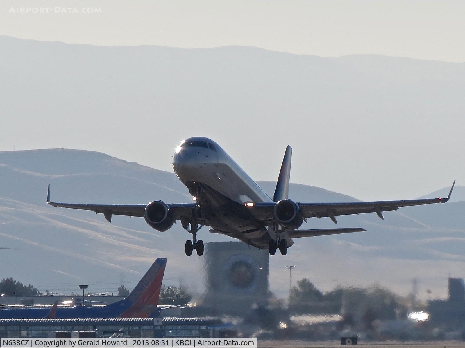 N638CZ, 2008 Embraer 175LR (ERJ-170-200LR) C/N 17000259, Early morning take off from RWY 28R.