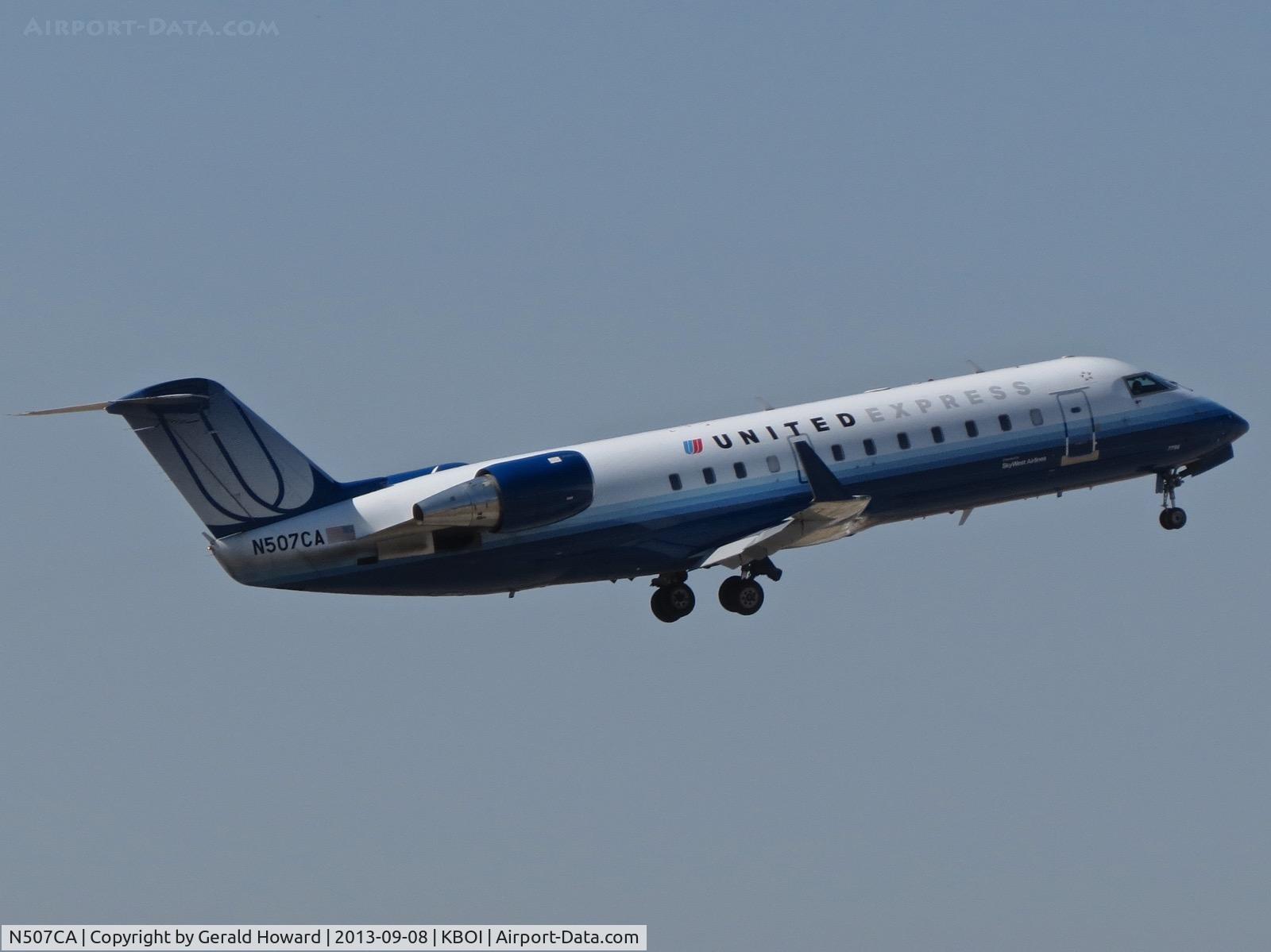 N507CA, 2003 Bombardier CRJ-200ER (CL-600-2B19) C/N 7796, Climb out from RWY 28R.