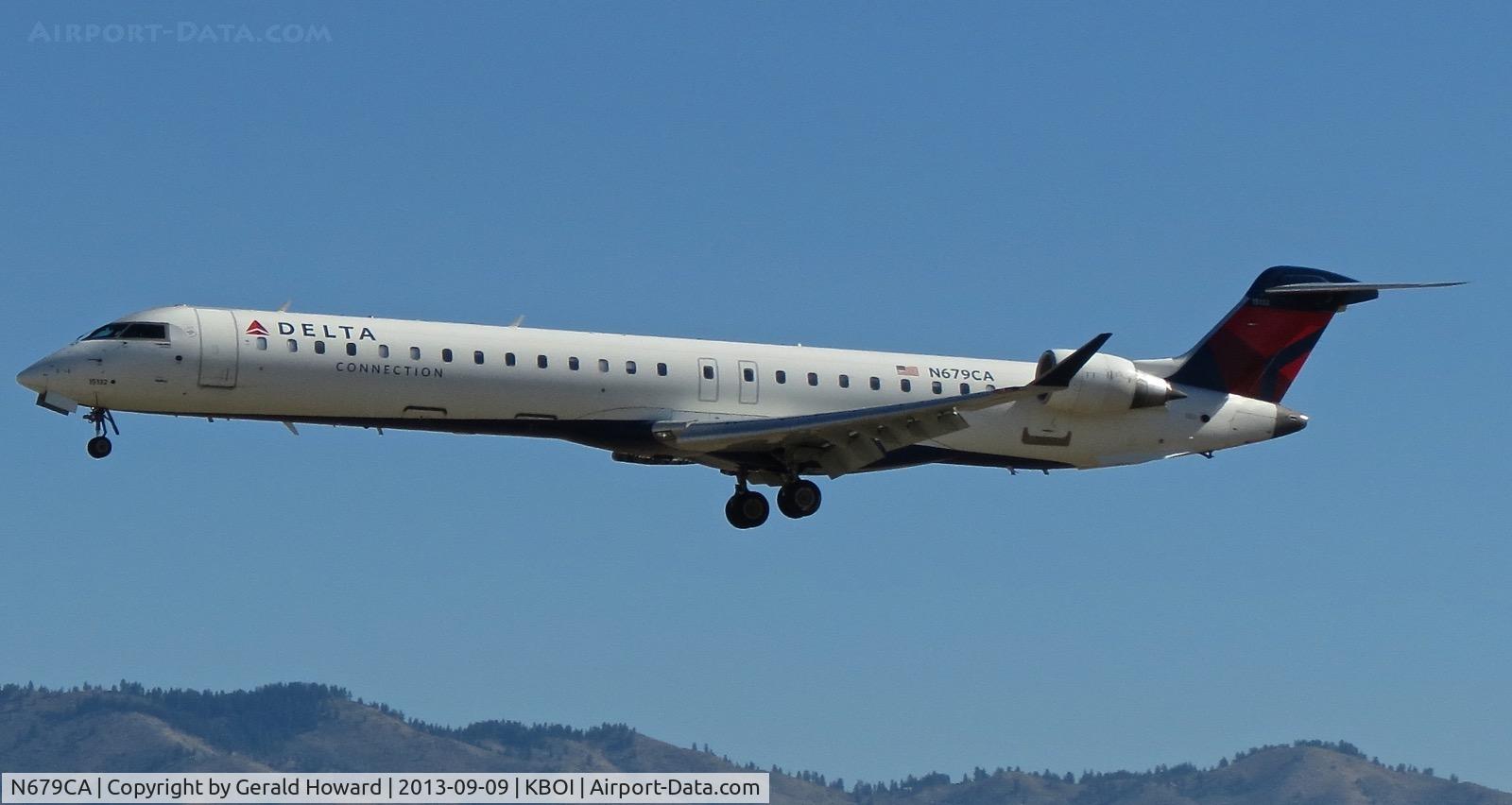 N679CA, 2007 Bombardier CRJ-900ER (CL-600-2D24) C/N 15132, Landing RWY 28L.