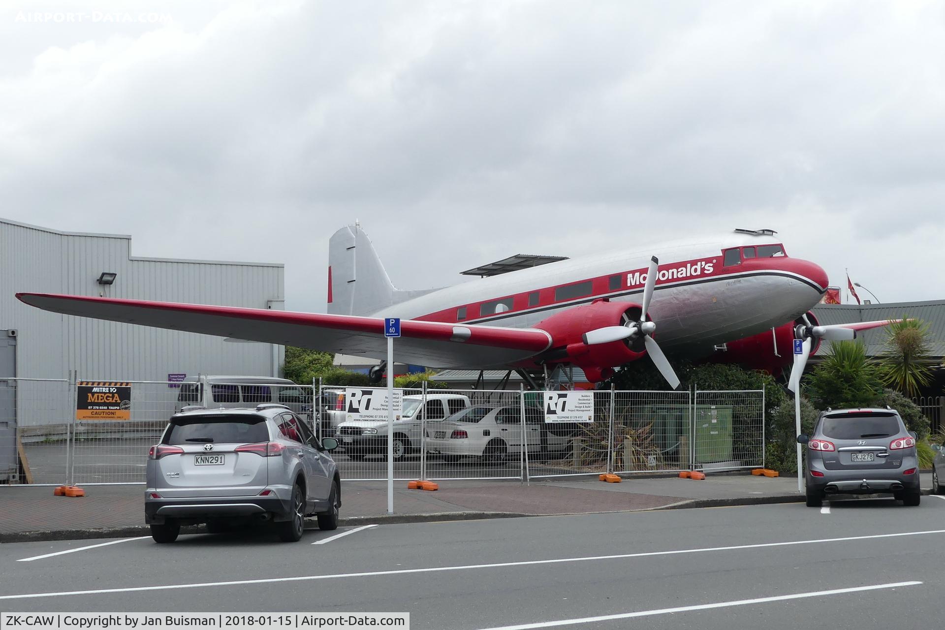 ZK-CAW, 1943 Douglas DC-3 C/N 18923, Taupo, NZ, in city, part of McDonalds