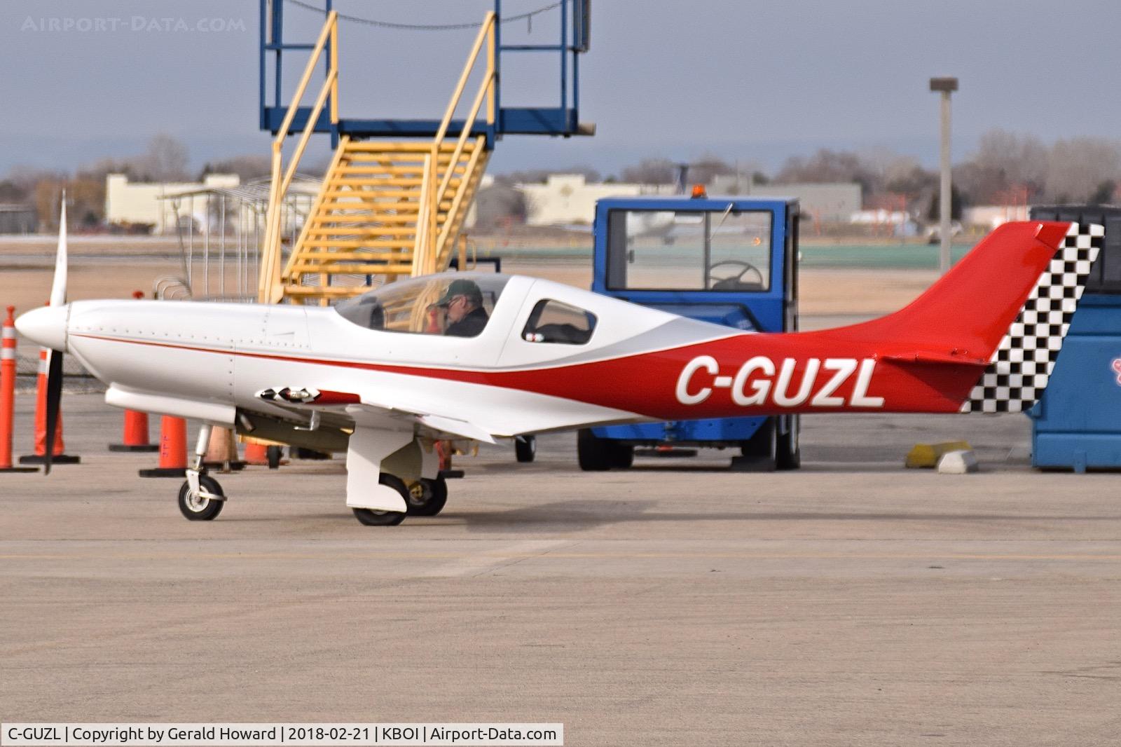 C-GUZL, 2008 Lancair 360 C/N 470-320-216, Warming up on the north GA ramp.