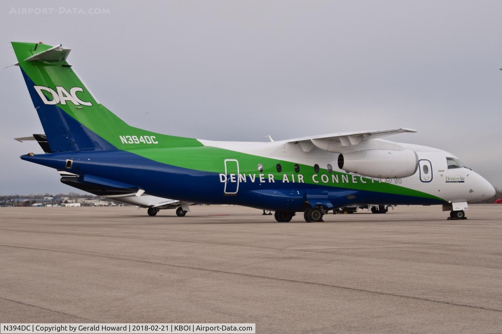 N394DC, 2001 Fairchild Dornier 328-300 328JET C/N 3174, Parked on the north GA ramp.