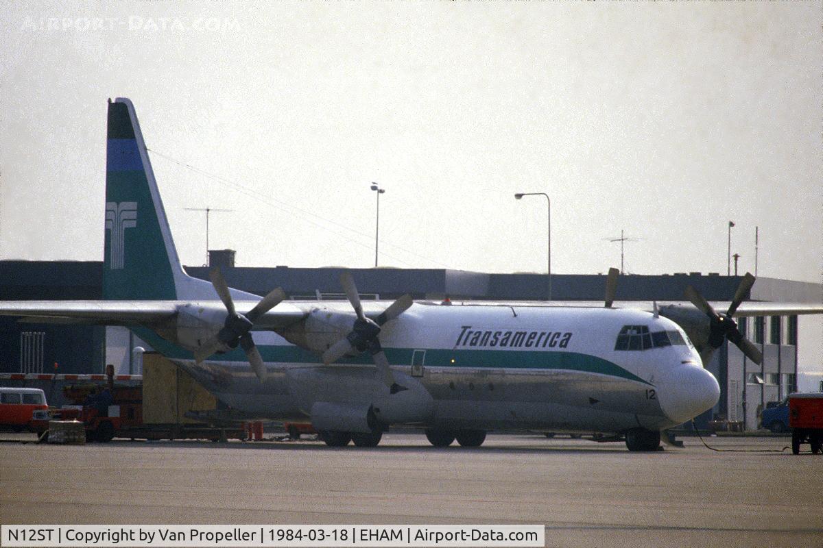 N12ST, 2004 Lockheed L-100-30 Hercules (L-382G) C/N 382-4388, Transamerica Airlines Lockheed L-100-30 Hercules on the platform of Schiphol-Oost, the Netherlands, 1984