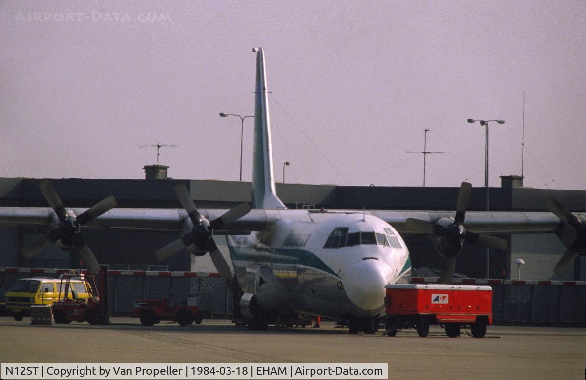 N12ST, 2004 Lockheed L-100-30 Hercules (L-382G) C/N 382-4388, Transamerica Airlines Lockheed L-100-30 Hercules on the platform of Schiphol-Oost, the Netherlands, 1984