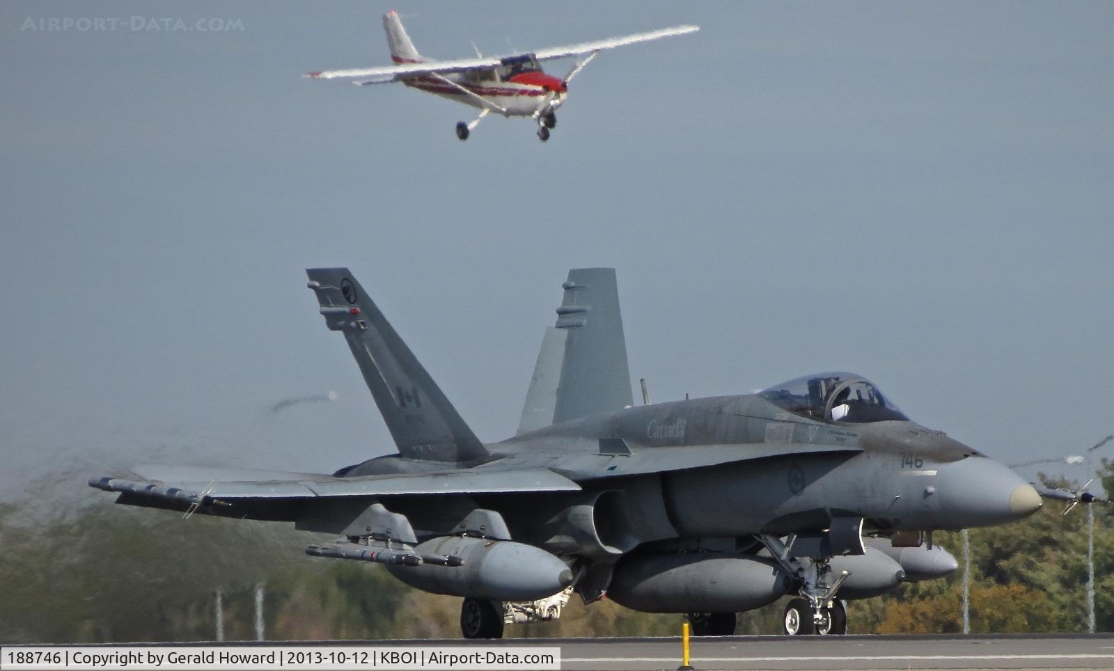 188746, McDonnell Douglas CF-188A Hornet C/N 0329/A273, 409 Squadron, Cold Lake, Canada.  Taking off on RWY 10R. The Cessna is for 10L.