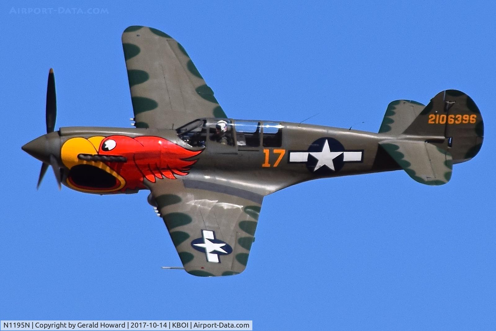 N1195N, 1942 Curtiss P-40N Warhawk C/N 130158, Fly by at the Gowen Field Air Show.