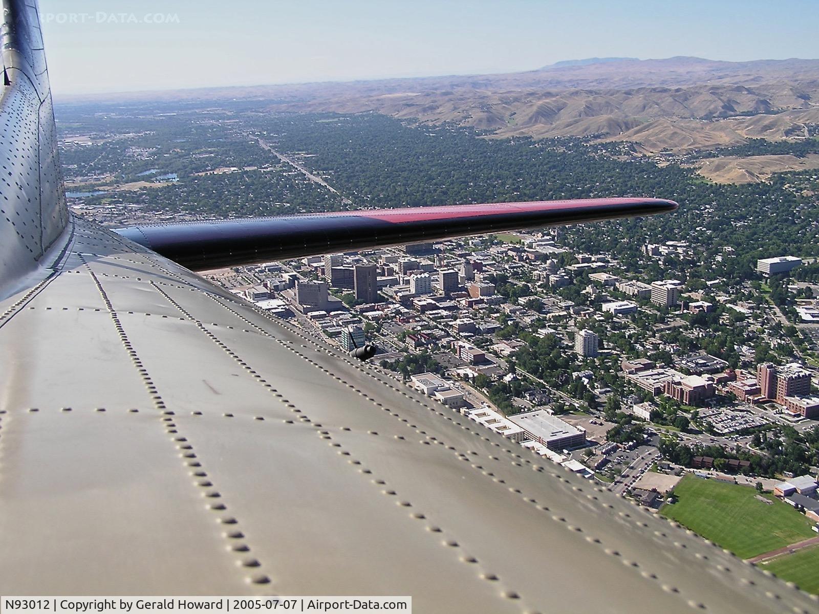 N93012, 1944 Boeing B-17G-30-BO Flying Fortress C/N 32264, Flying over Boise. Photo taken from open radio compartment window. A little windy, but one of the better seats.