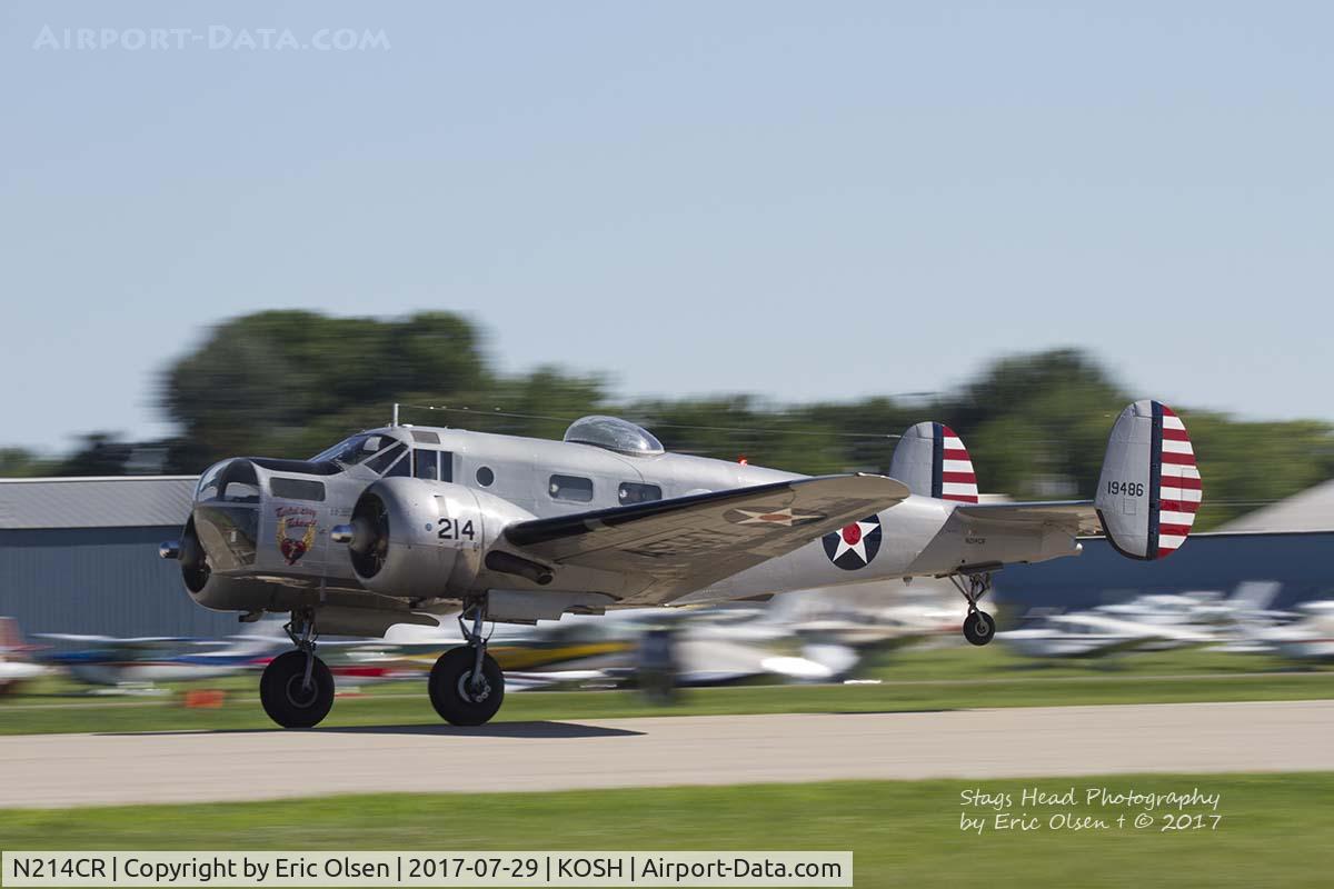 N214CR, 1958 Beech AT-11 Kansan C/N 912, Beech AT-11 departing Airventure.