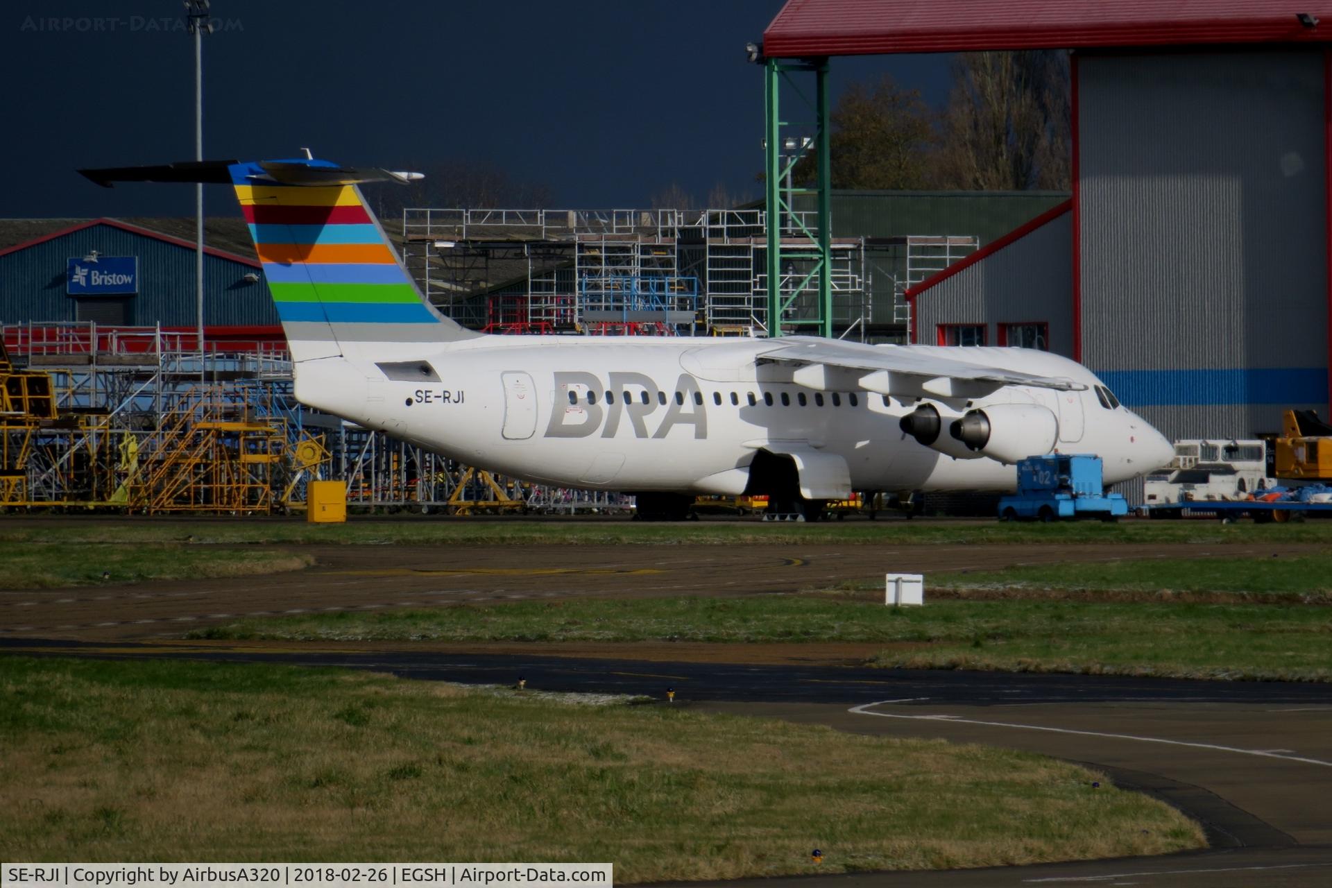 SE-RJI, 1999 British Aerospace Avro 146-RJ100 C/N E3357, Pasrked outside KLM Hangars at Norwich