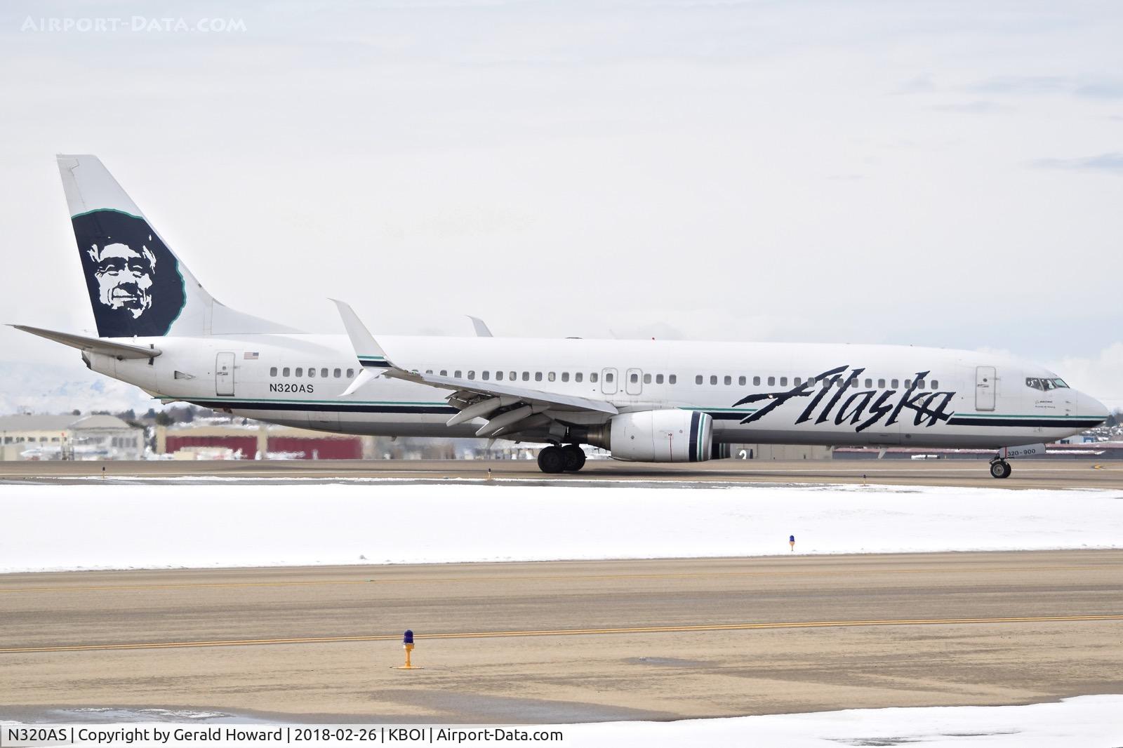 N320AS, 2003 Boeing 737-990 C/N 33680, Turning off RWY 28R.