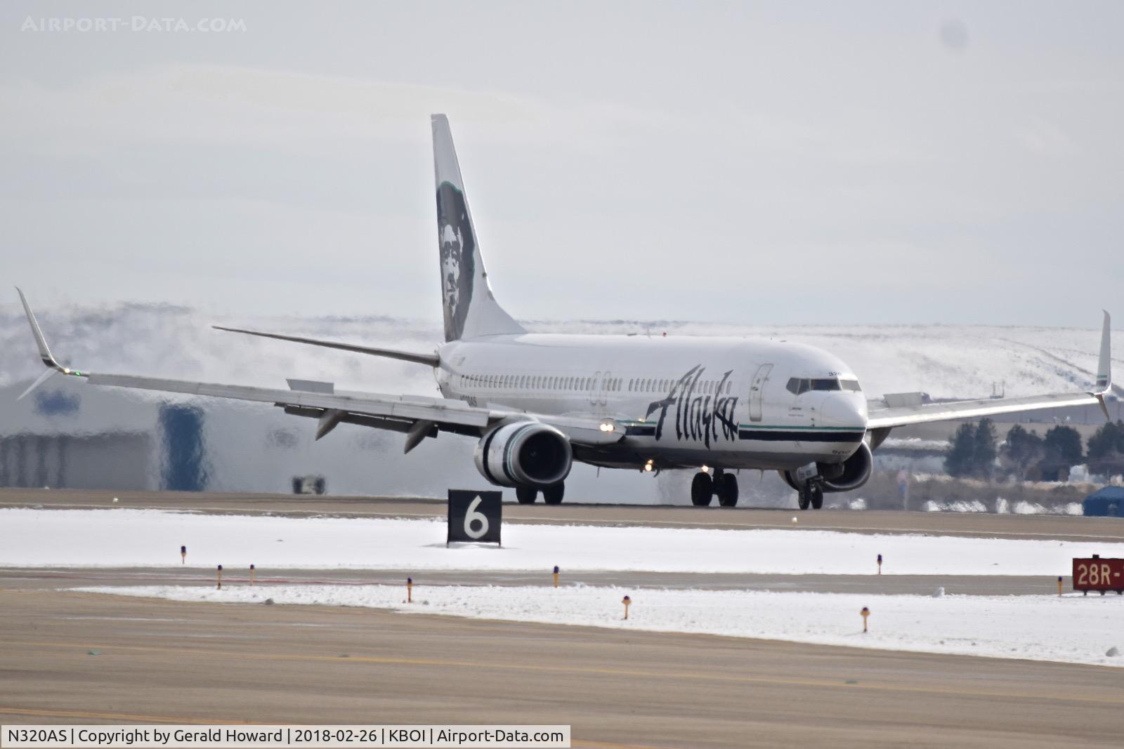 N320AS, 2003 Boeing 737-990 C/N 33680, Landing roll out on RWY 28R.