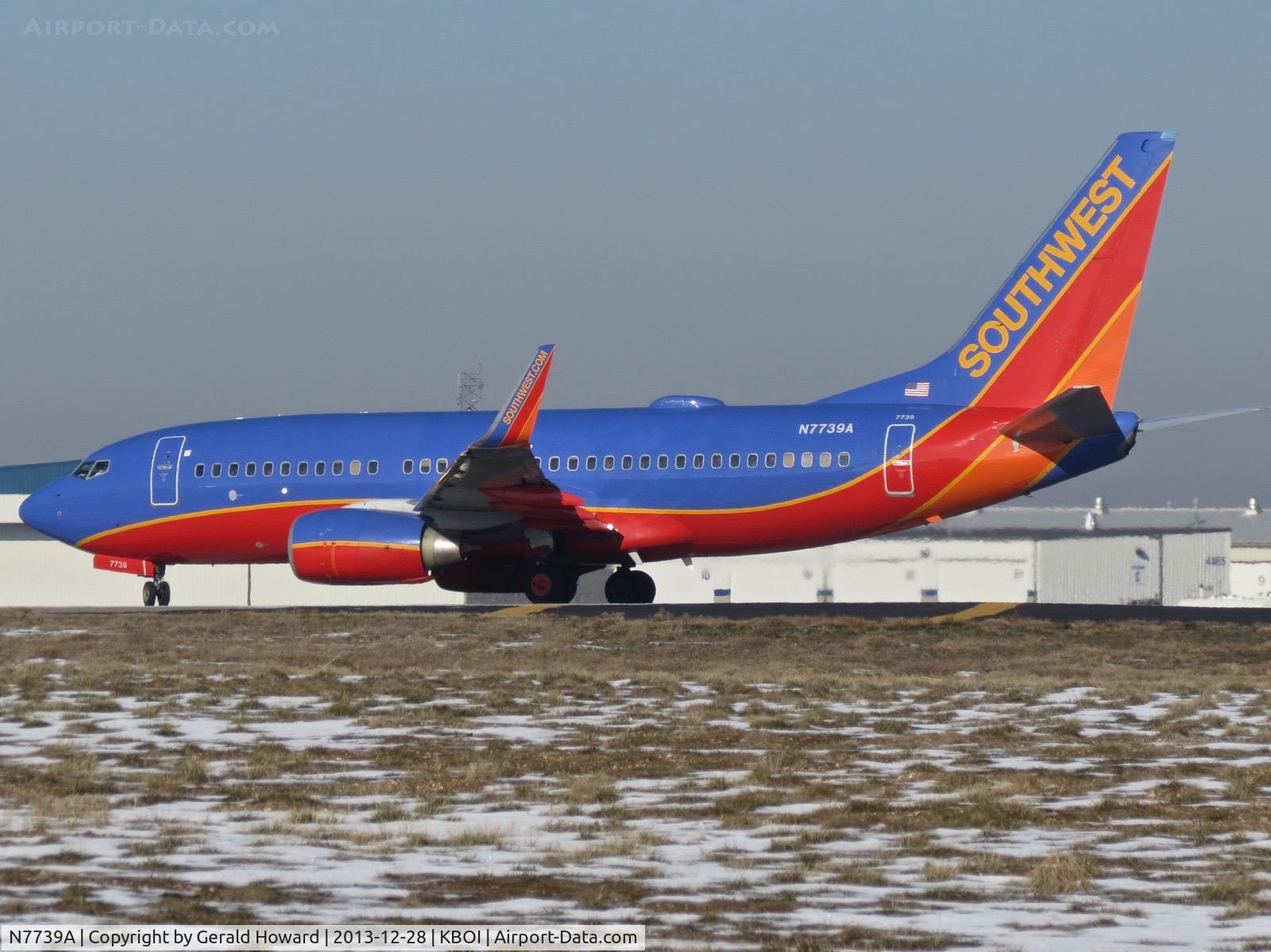 N7739A, 2006 Boeing 737-7BD C/N 35110, Turning onto RWY 28R from Alpha.