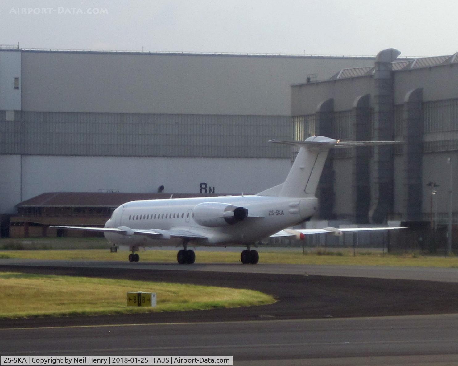 ZS-SKA, 1995 Fokker 70 (F-28-0070) C/N 11559, Seen from arriving aircraft about 6pm on 25 Jan 2018.  No obvious airline ownership visible.