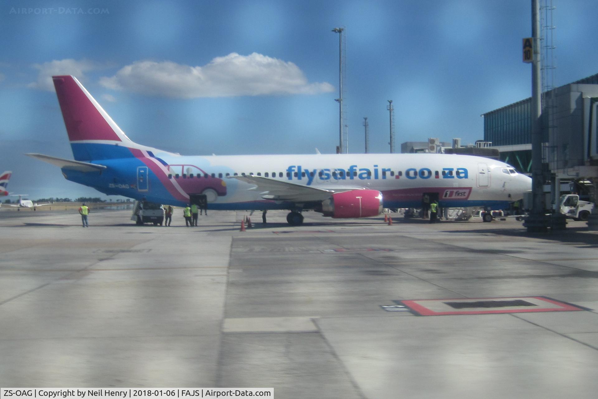 ZS-OAG, 1993 Boeing 737-4H6 C/N 27168, Having previously seen this aircraft in BA and Kumala colours, I took this through a wire fence in its SafAir guise, whilst waiting to board flight JNB to Cape Town on 06 January 2018 .   Sorry about the quality!