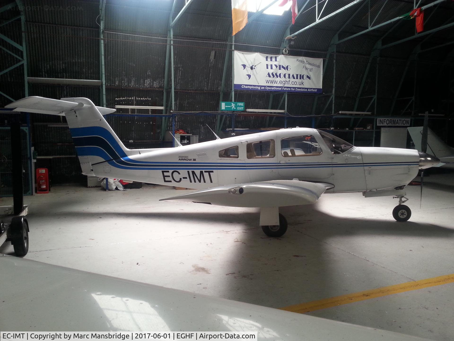 EC-IMT, 1979 Piper PA-28RT-201 Arrow IV C/N 28R-7918165, Parked in a hanger at Lee-on-Solent Airport EGHF