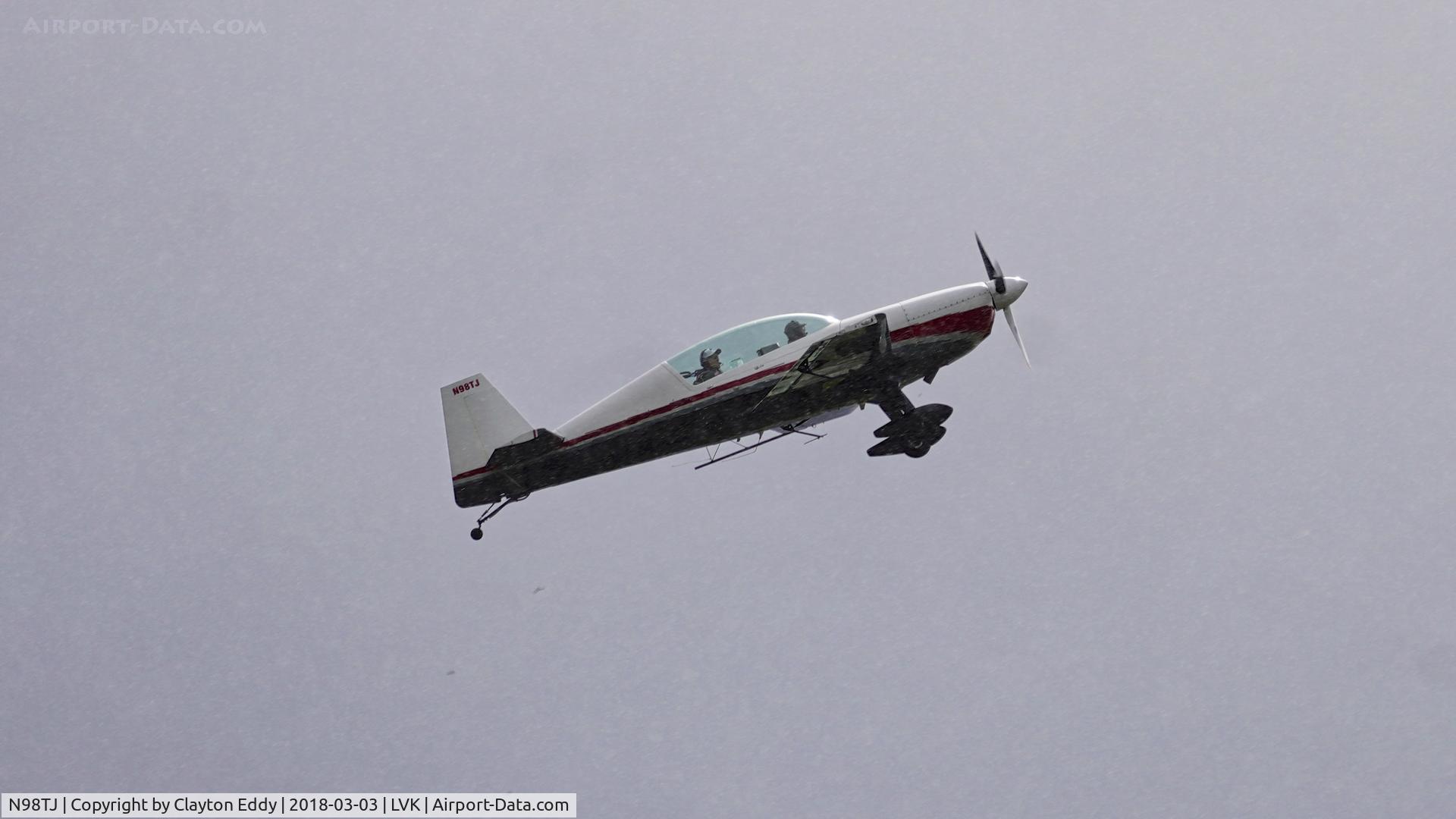 N98TJ, 1998 Extra EA-300/L C/N 065, Livermore Airport California in the rain. 2018.