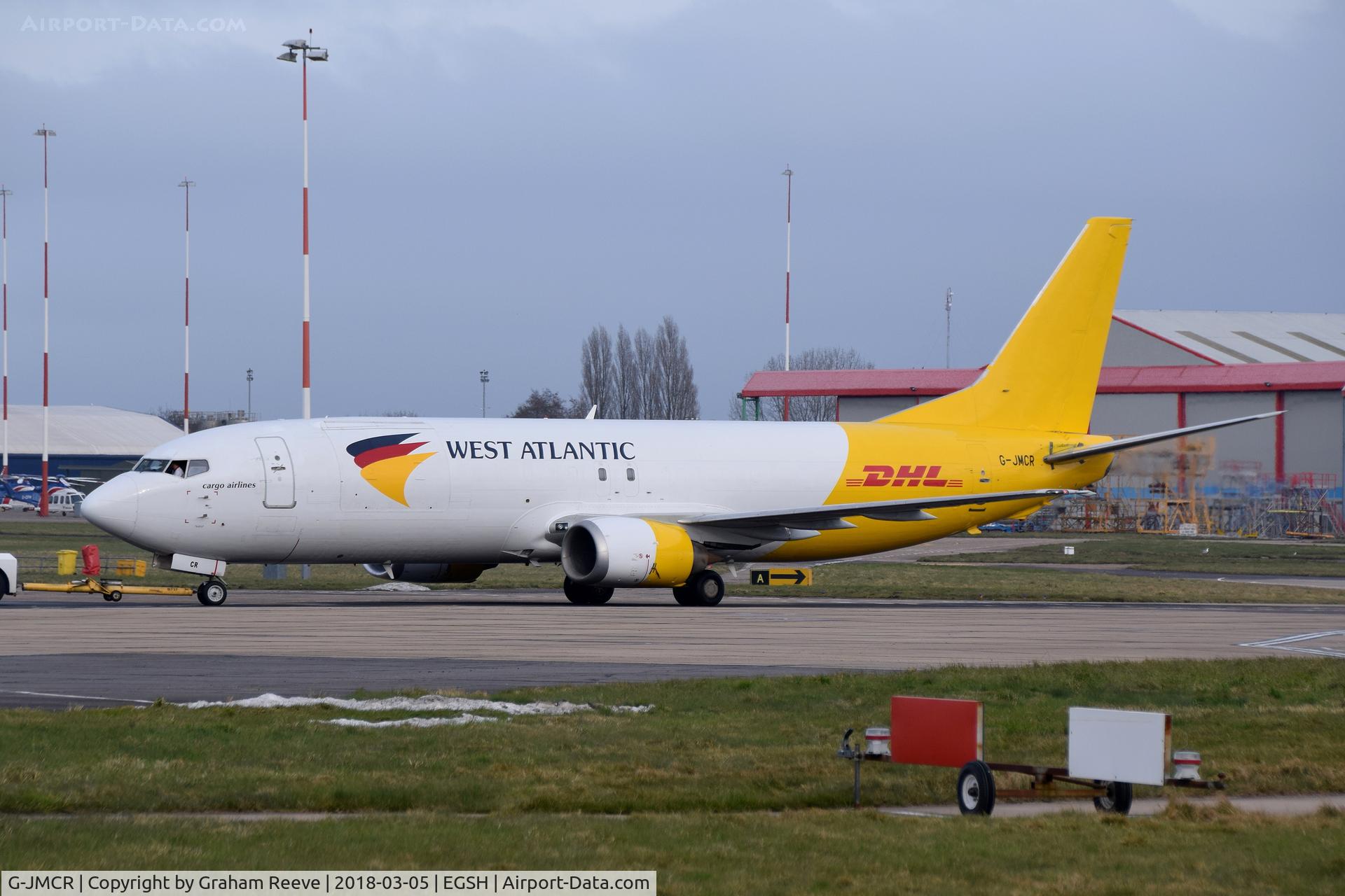 G-JMCR, 1992 Boeing 737-4Q8(SF) C/N 25372, Under tow at Norwich.