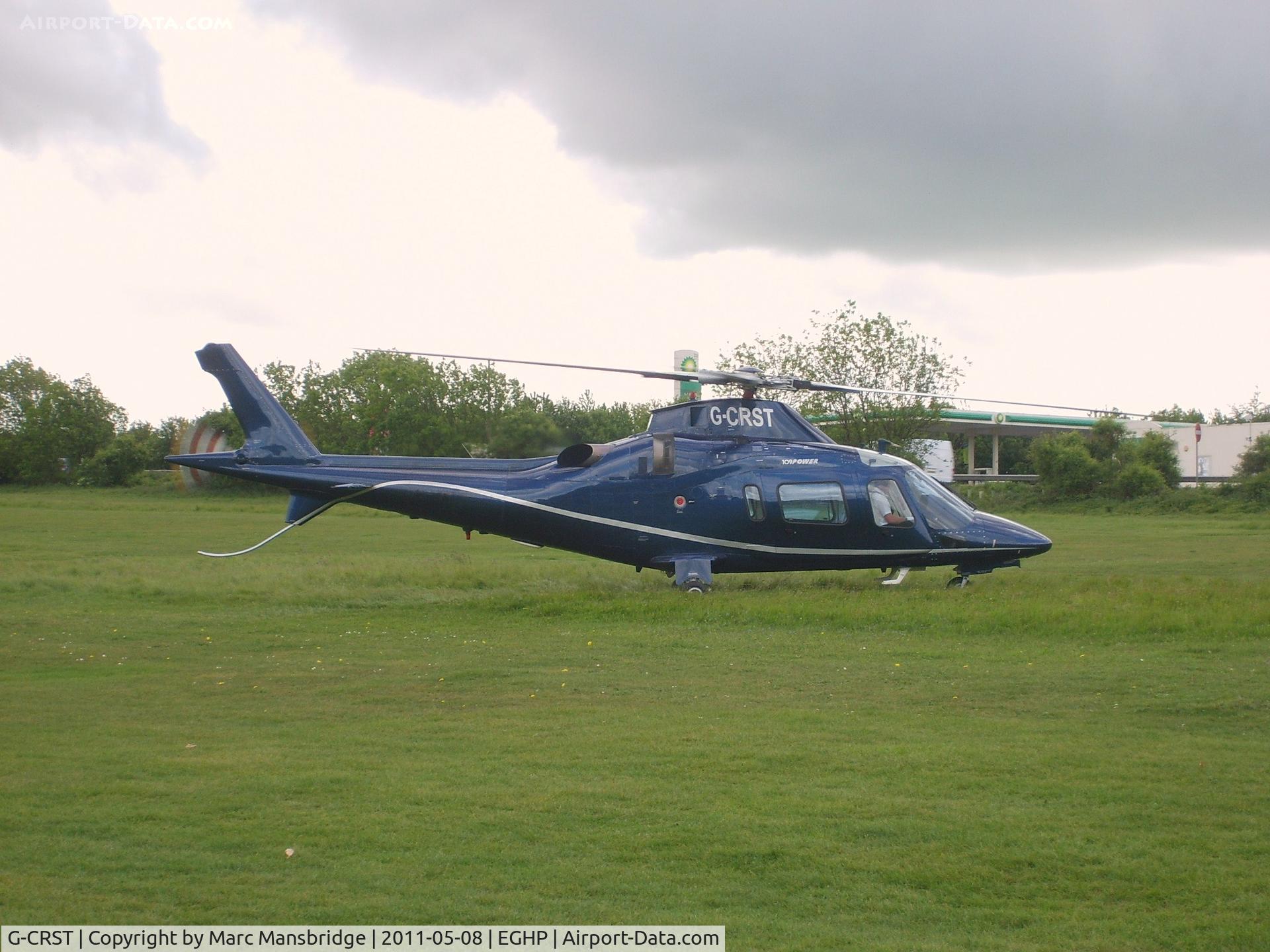 G-CRST, 1998 Agusta A-109E Power C/N 11017, Crashed in Vauxhall in London on the 16-JAN-2013 after hitting a tower crane in thick fog. The pilot and one person on the ground was killed, 9 more were injured. RIP to the Fatalities. 

Seen here at Popham airfield EGHP